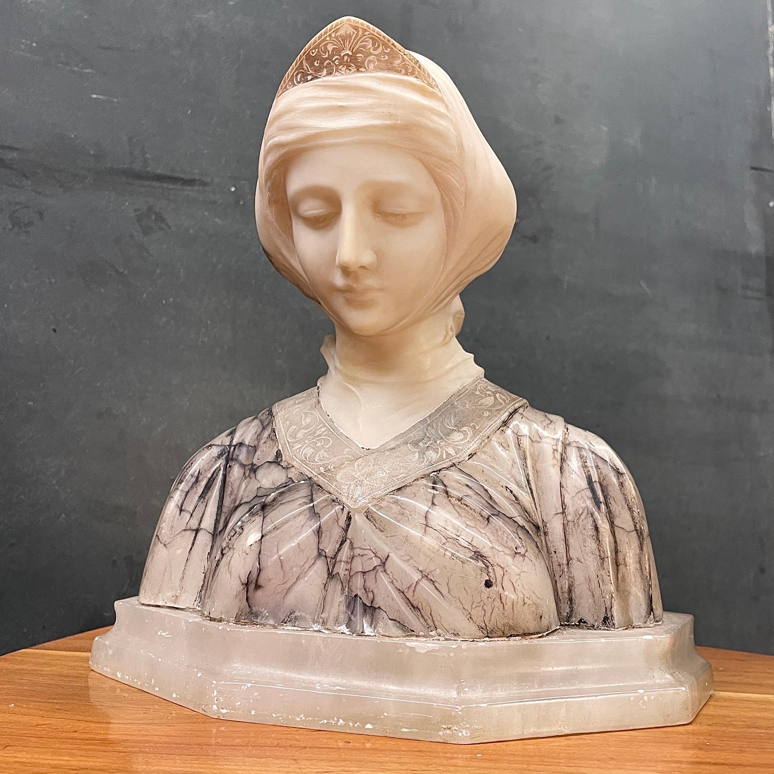Beautifully executed bust of a female.  Resembling the famous bust of Beatrice.  No signature has been found.  The artist remains unknown to us.

Wt. 15.8125 lb / 7.1724 kg