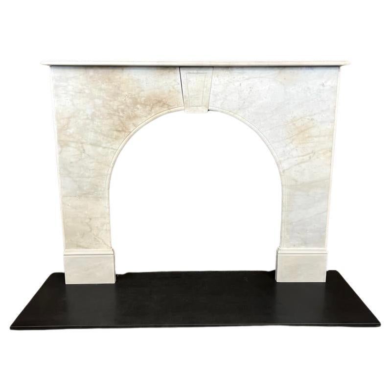 19th century Marble Fireplace Mantlepiece
Hand Caved Original Arched Fireplace Surround With Centre Key Stone.
English Made From The Victorian Period In White Italian Carrara Marble.
Recently Salvaged From A London Town House. 
Structurally In Good