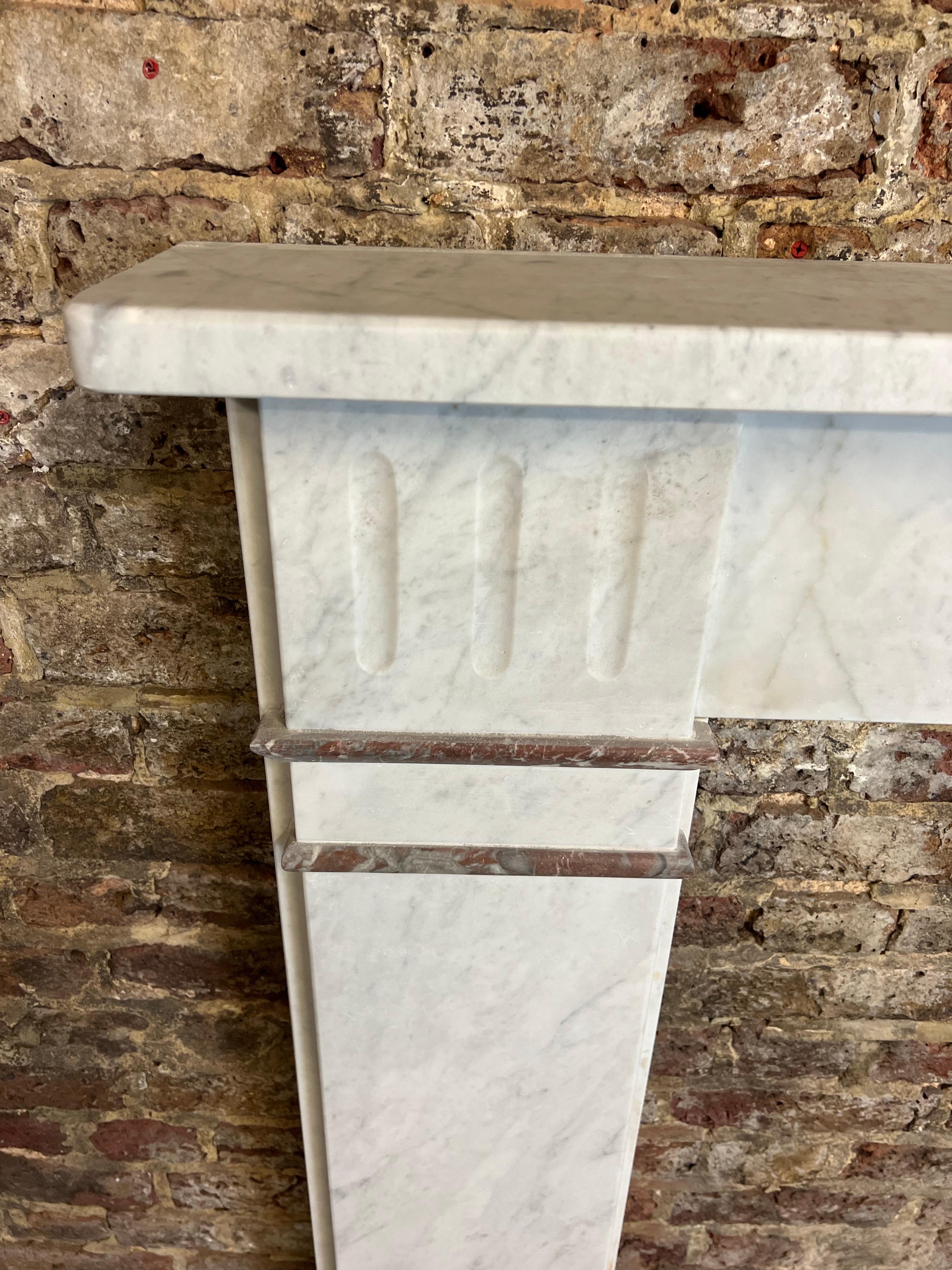 19th Century Marble Fireplace Surround Mantlepiece.
Recently Salvaged From A London Town House.
Dated Circa 1880. Predominantly Made To A Classic Flat Victorian Classic Design.
Made From Light Italian Carrara Marble With Rossa Rossa Detailsing to