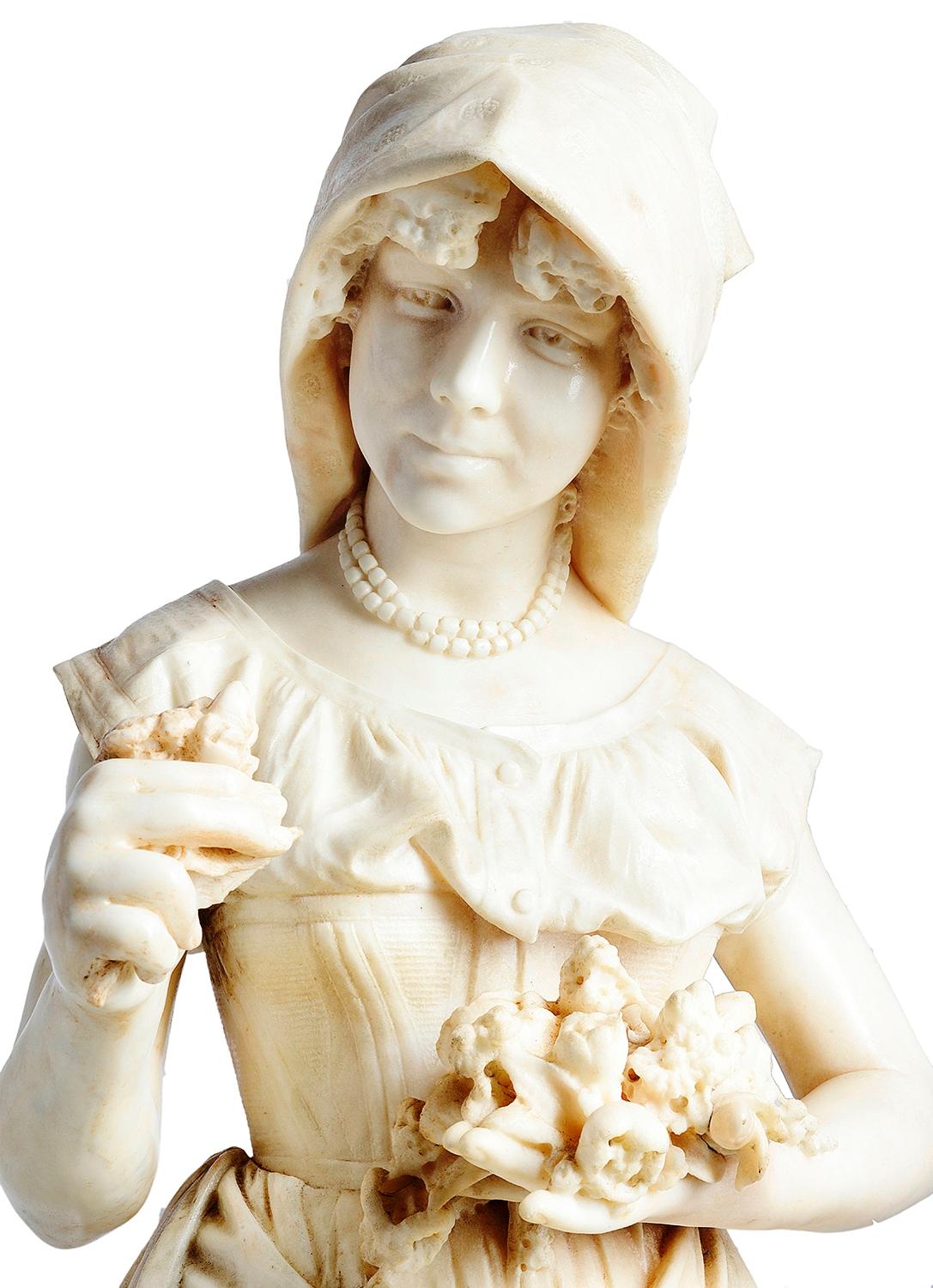 A beautifully carved Carrara marble statue of a flower girl.
Signed; Prof A. Cambi, Firenza 1893.