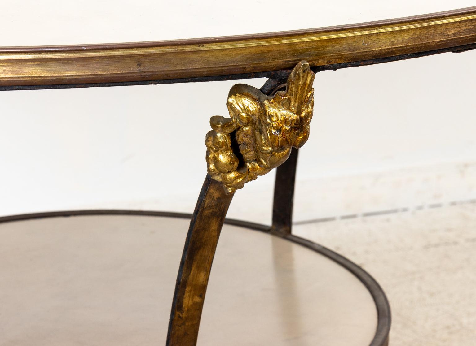 A French 19th century marble and bronze gueridon with ram’s head ormolu ornamentation and hoof form feet. Please note of wear consistent with age.