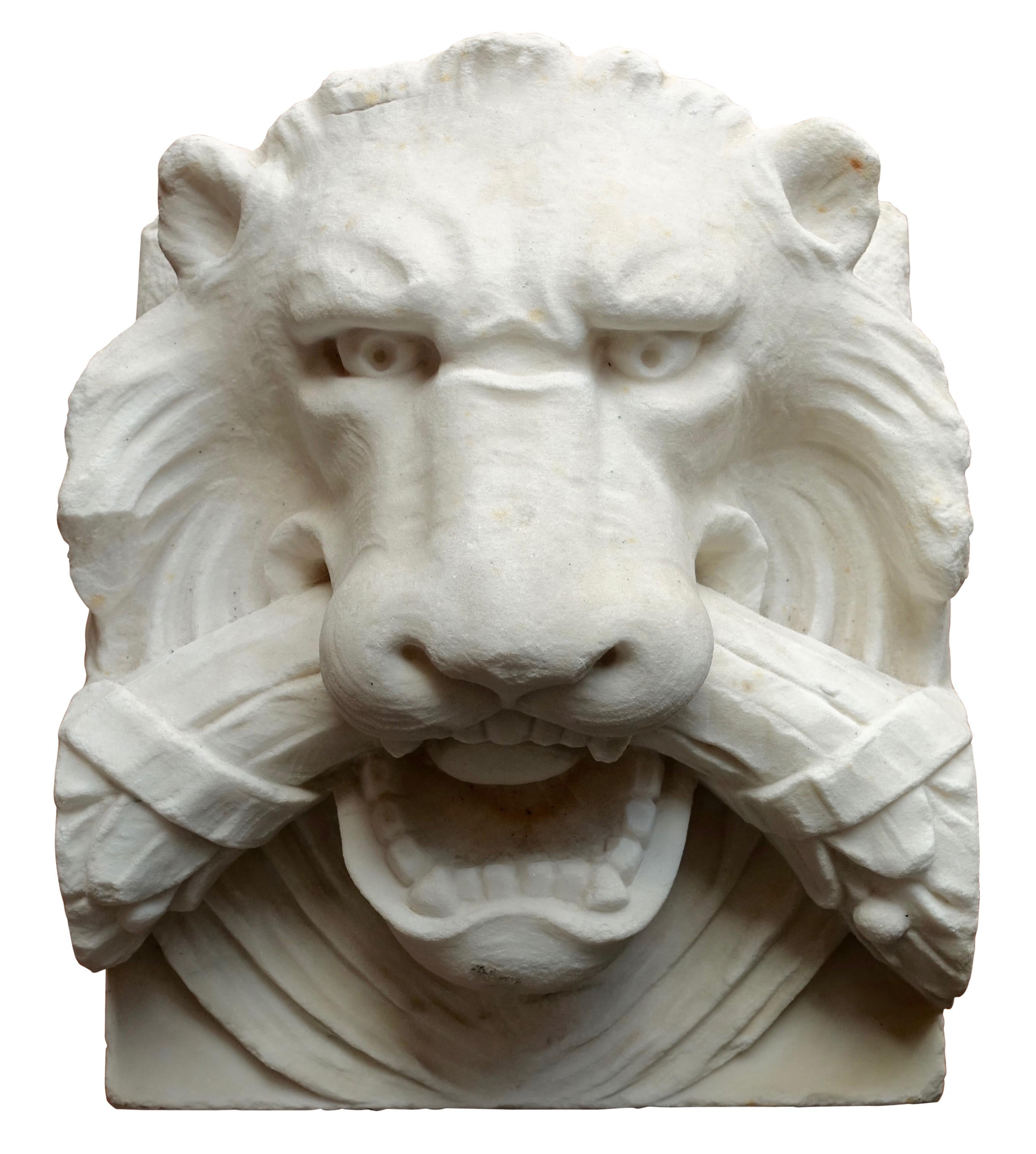 A wonderfully detailed carved white marble architectural element or sculpture of a lion head. European 19th century.