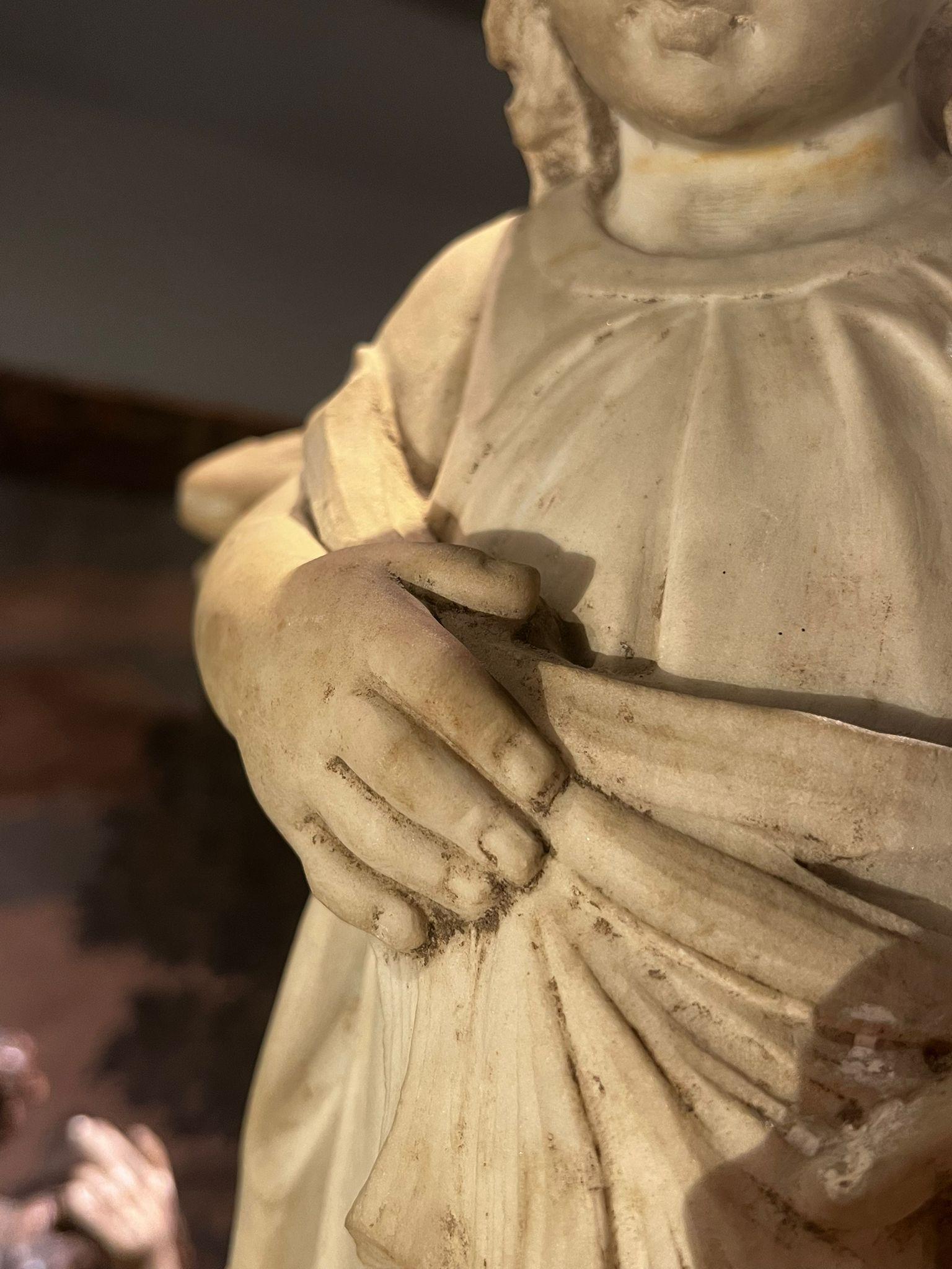 Carrara Marble 19th century marble sculpture of a little angel For Sale