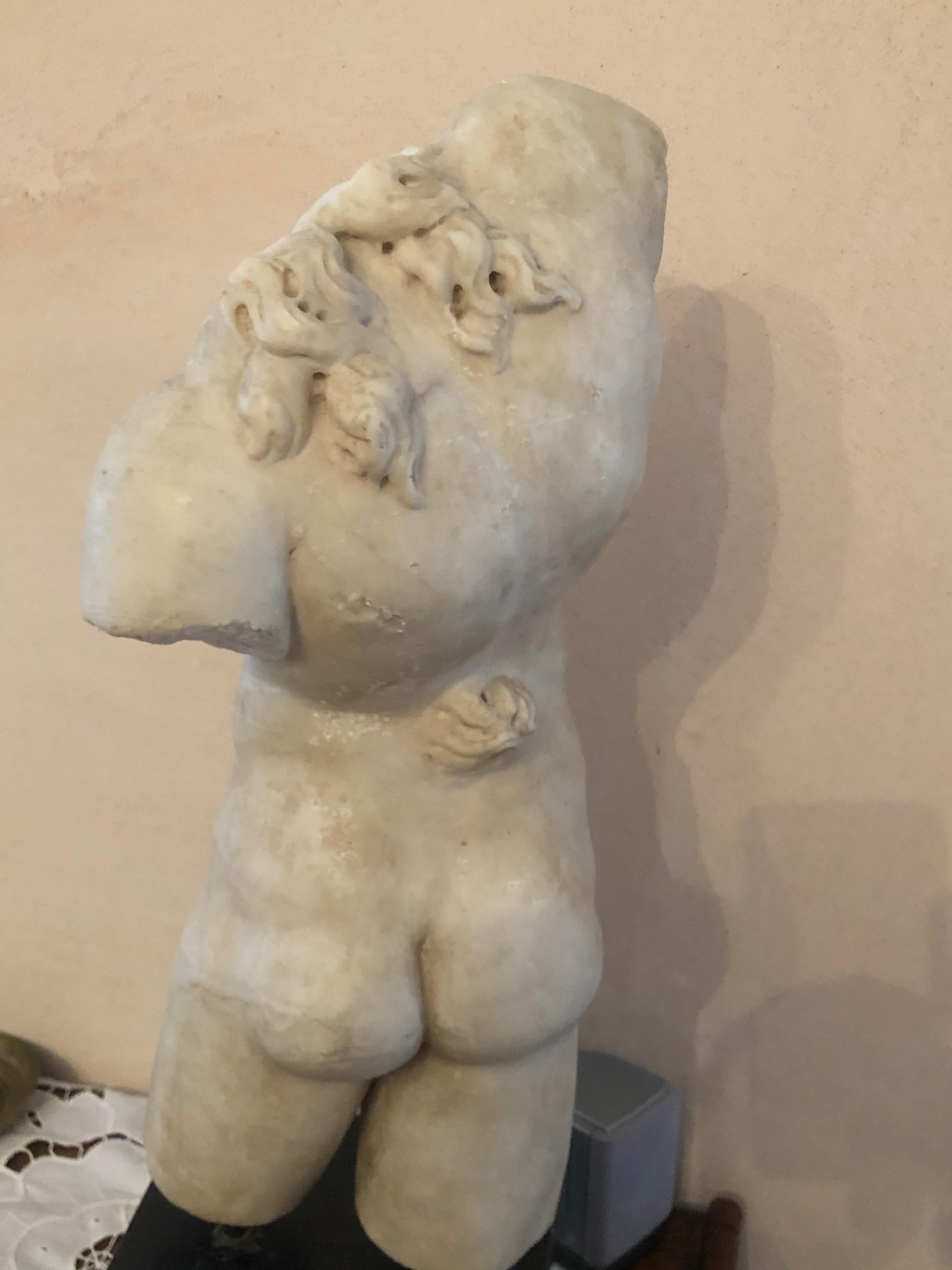 sculpture of naked man