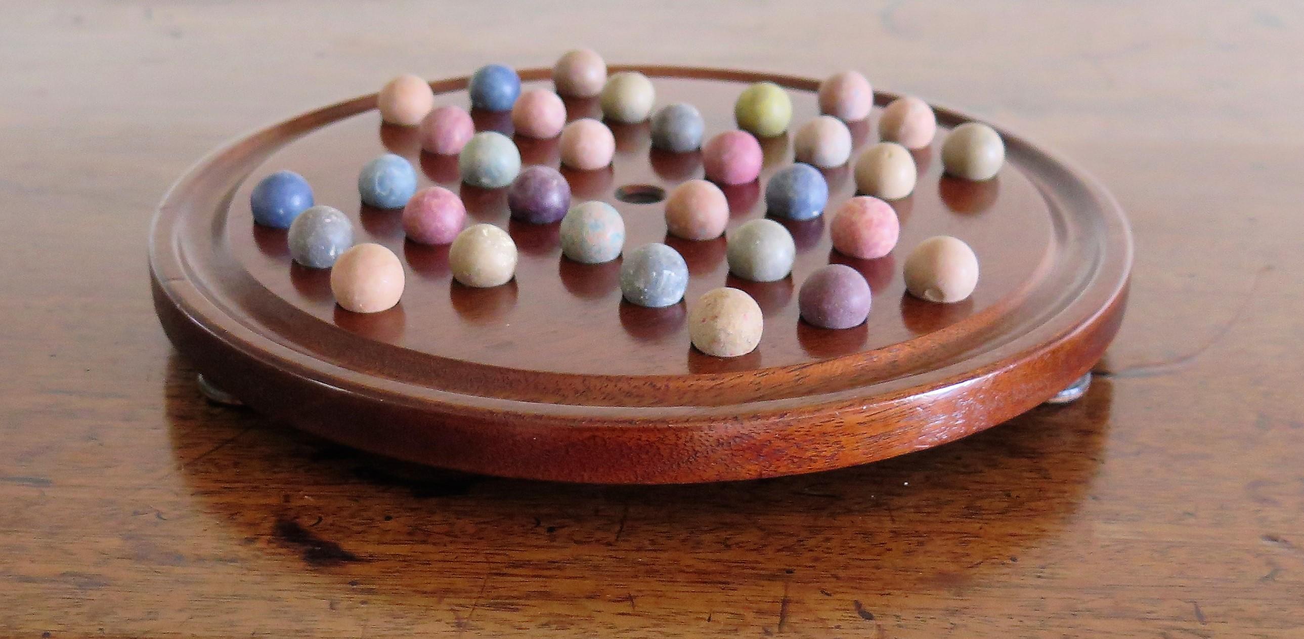 19th Century Marble Solitaire Game with Handmade Mahogany Board and 32 marbles 3