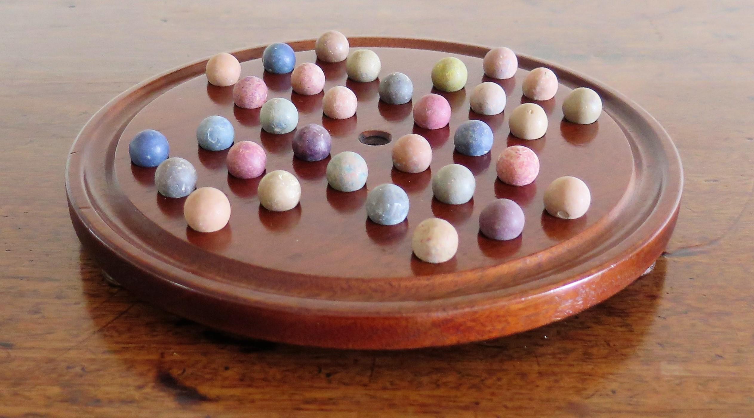19th Century Marble Solitaire Game with Handmade Mahogany Board and 32 marbles 4
