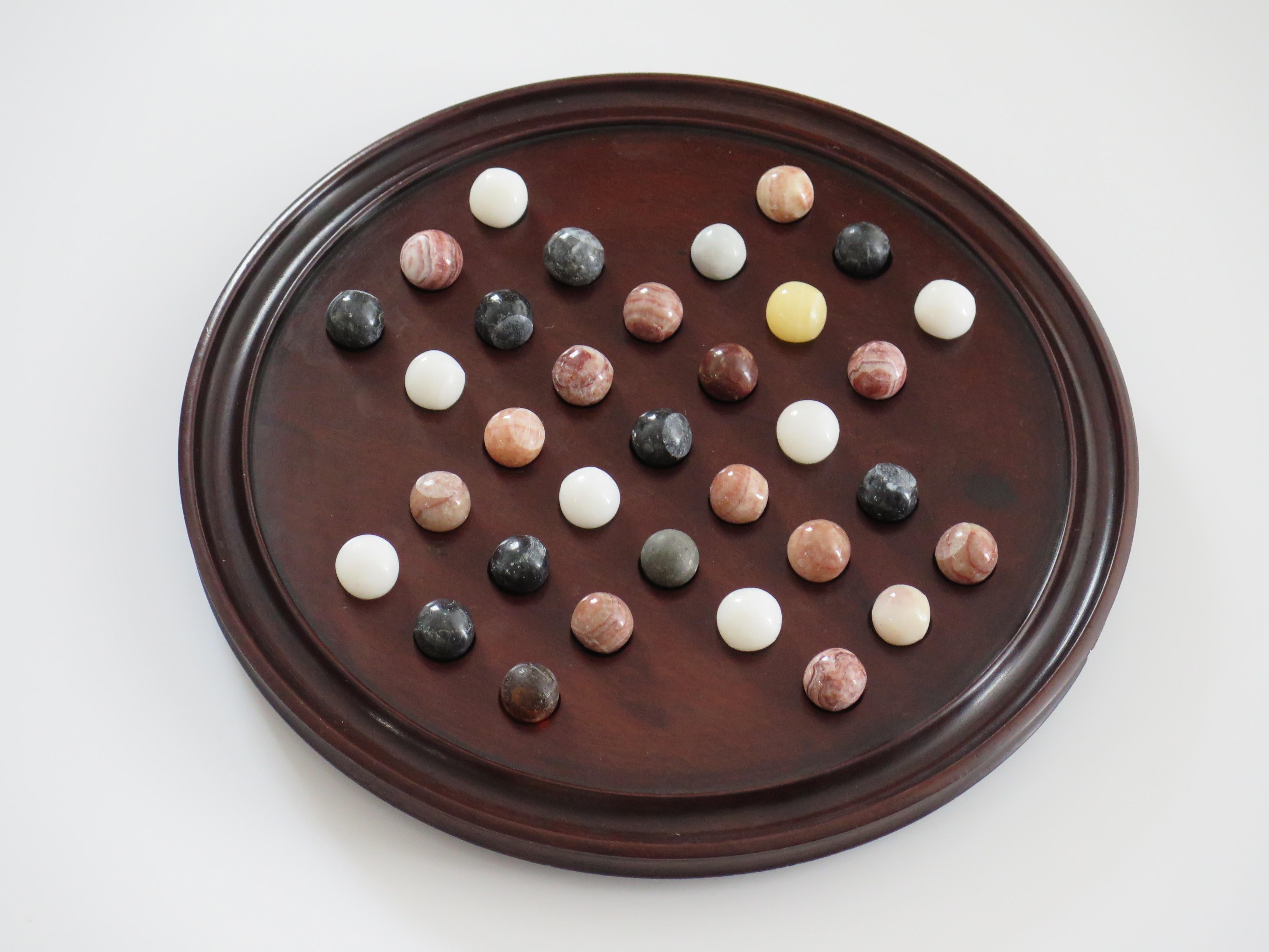 Victorian 19th C. Marble Solitaire Game large diameter Hardwood Board and 33 agate marbles