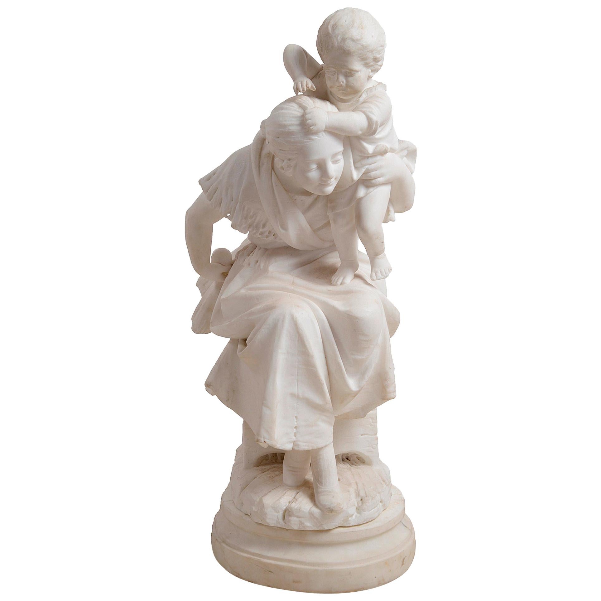 statue en marbre du 19ème siècle représentant une mère et un enfant en vente