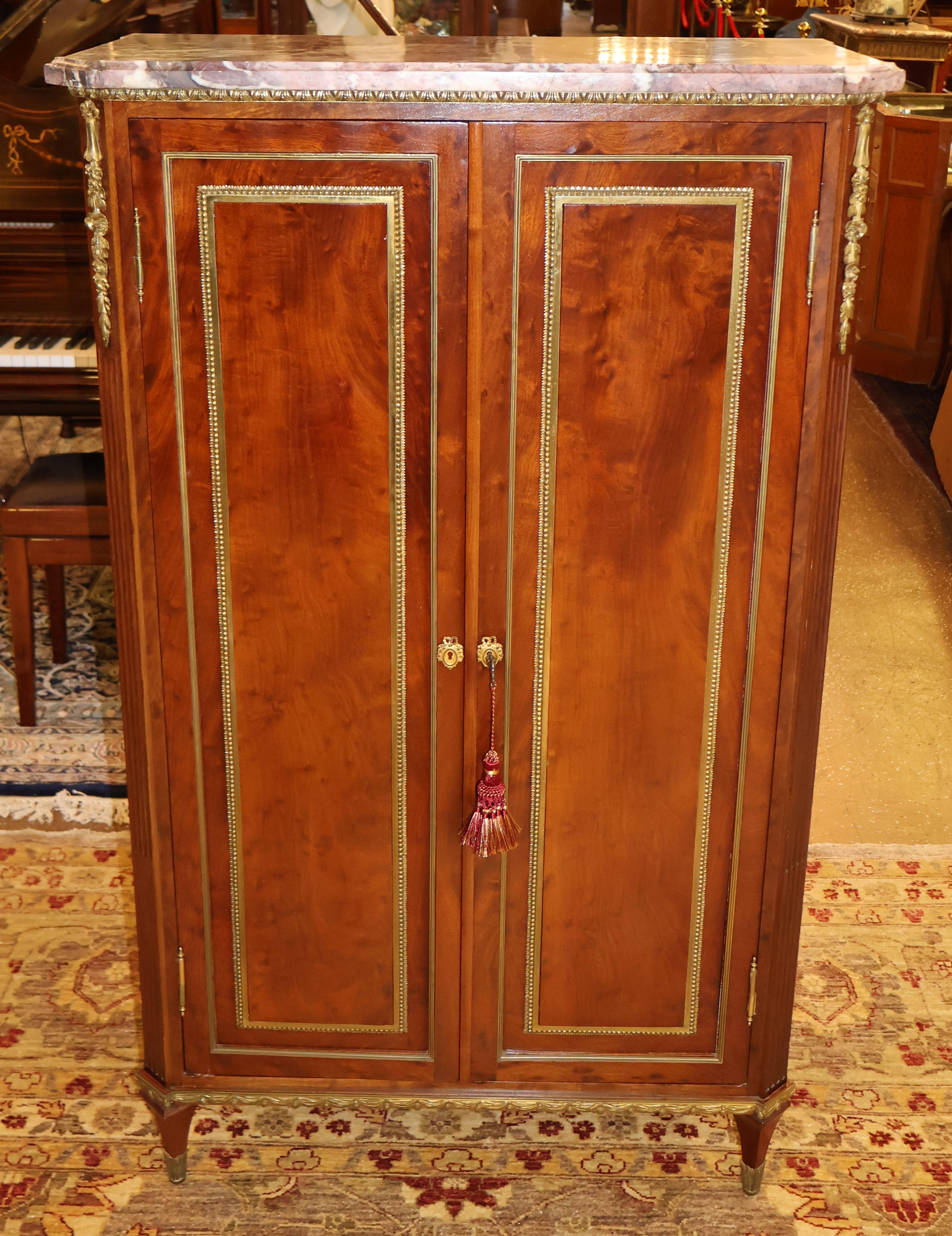 19th Century Marble Top Bronze & Plum Pudding Mahogany Cabinet By  L. Cueunieres

Dimensions : 32.5