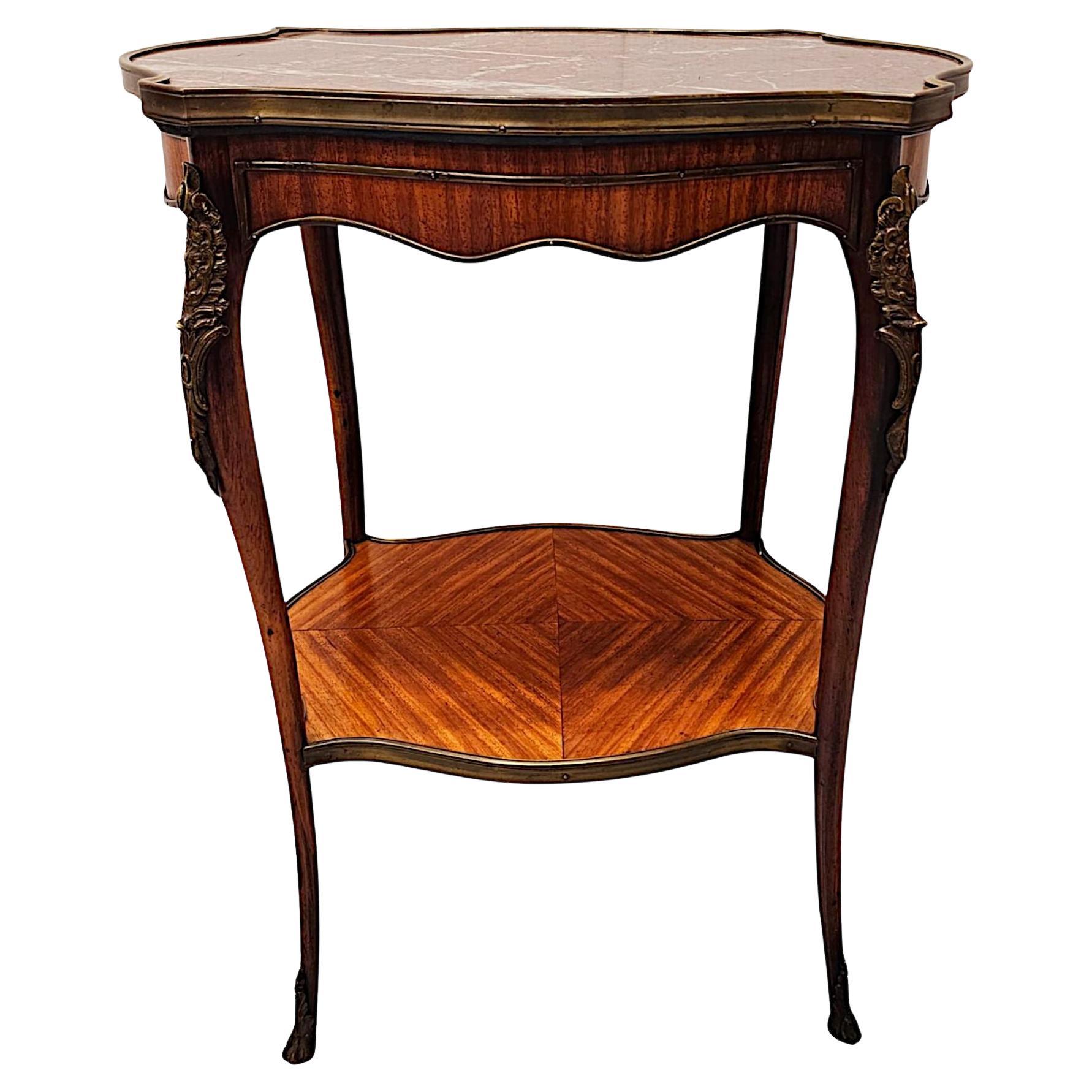xIX secolo  Tavolo occasionale o da lampada con piano in marmo e supporti in ormù