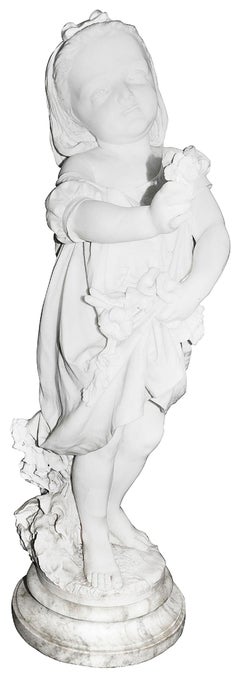 19th Century Marble young girl holding a flower. Signed; P. Della Vedova