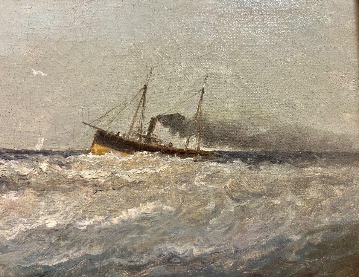 A small 19th-century marine oil-on-canvas painting depicting two ships navigating the waves of the deep sea on a rather tranquil day. It has been restored with complete re-lining. It bears the signature of Paul Seignon (1820-1890) in the bottom left