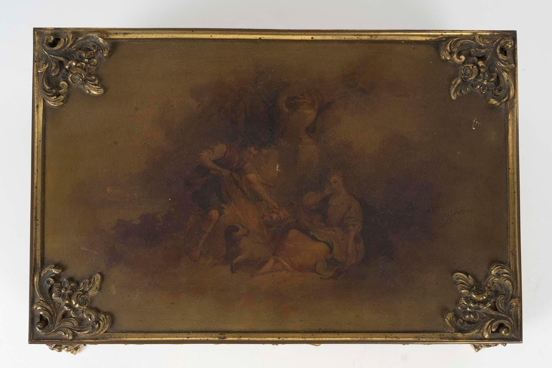 Scatola Martin del XIX secolo con vernice e ormolatura e interno imbottito.
H: 12cm, L: 36cm, P: 24cm