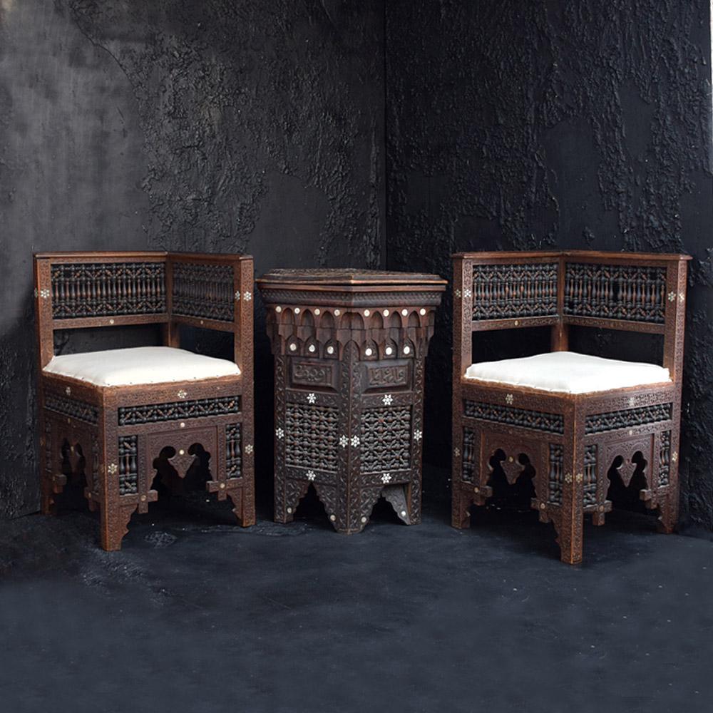 19th Century matched pair of Moorish Syrian Hand-Crafted chairs

An extremely well hand-crafted matched pair of late 19th century Syrian Moorish chairs. Recently re-padded seats with new calico fabric. The hand carved detail across these chairs is