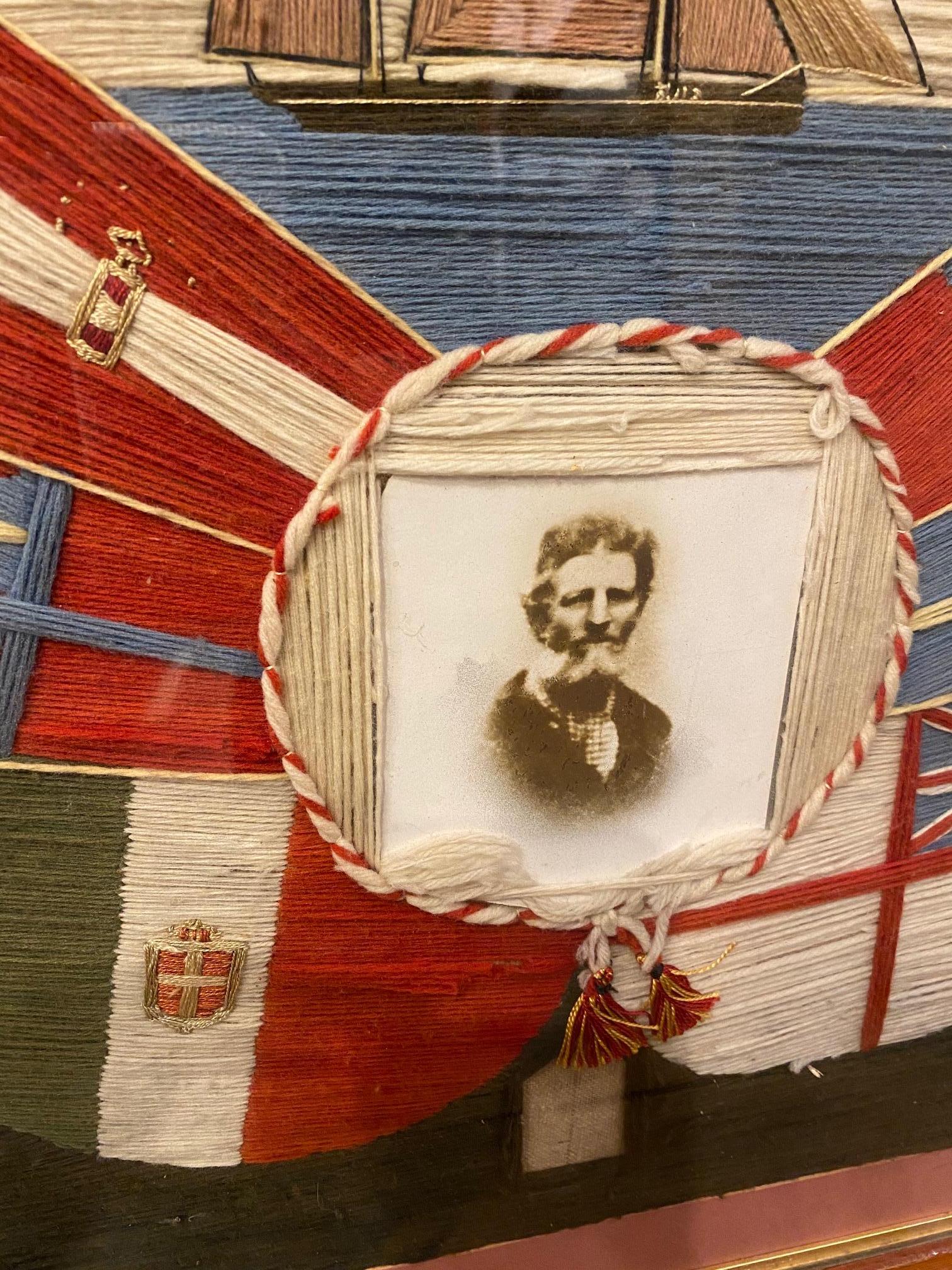 Very unusual 19th century matched pair of sailor's Yachting Woolies, circa 1870, a true pair of woolworks featuring mirror images of the same Yawl rigged yacht, and period photographs of the husband and wife sailors surrounded by the flags of all