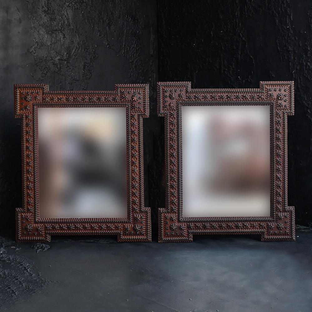 19th 
century matched pair of tramp mirror frames
A highly decorative example of a matched pair of late 19th century tramp art chip work mirrors. Hand carved frames with newly added mirror plates. A real asset to any stylised interior design