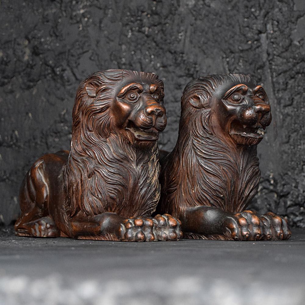 19th Century Matched Pair of Recumbent Carved Mahogany Lions In Fair Condition For Sale In London, GB