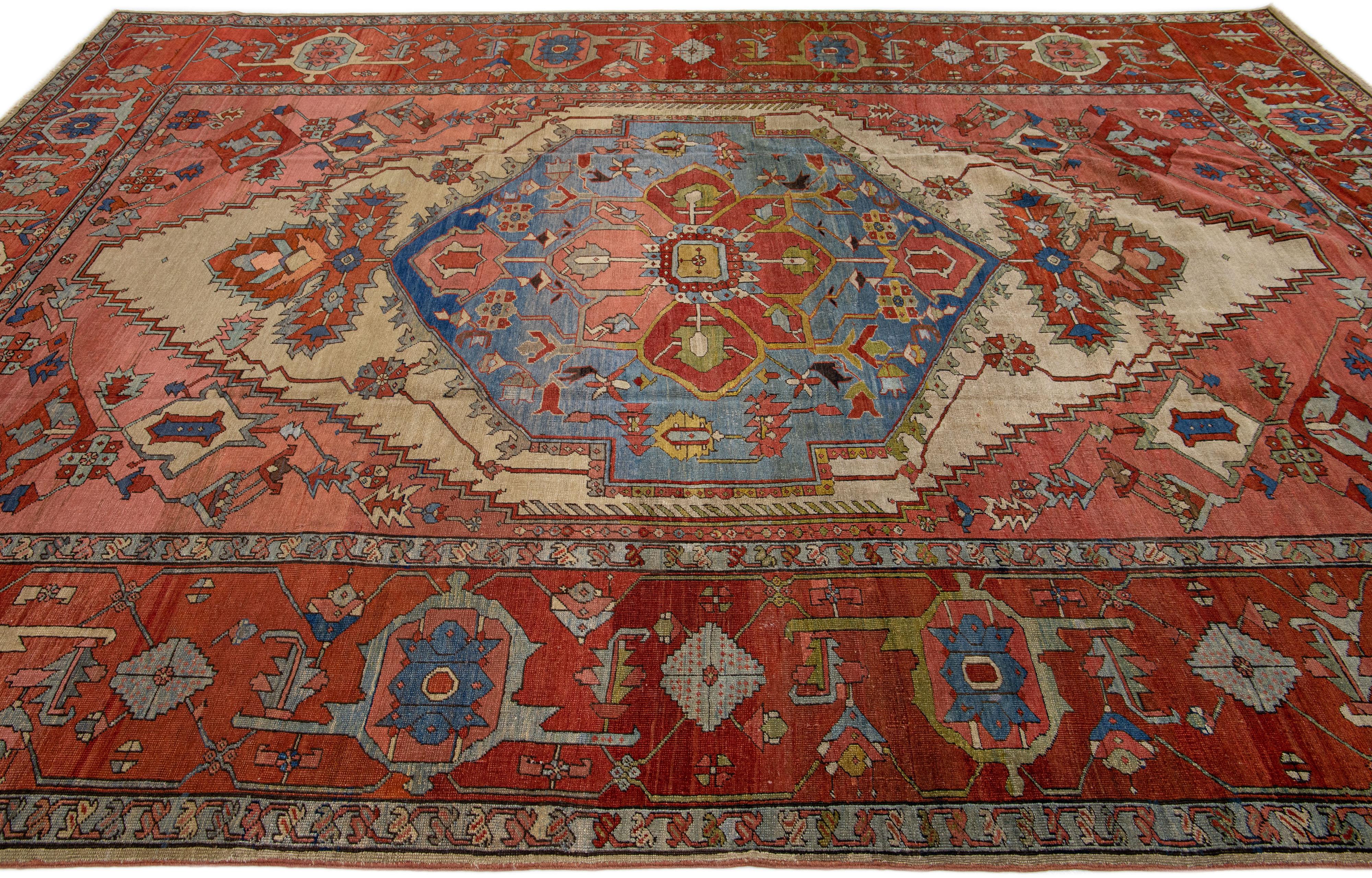 Pakistani 19th Century Medallion Handmade Serapi Style Antique Wool Rug in Rust For Sale