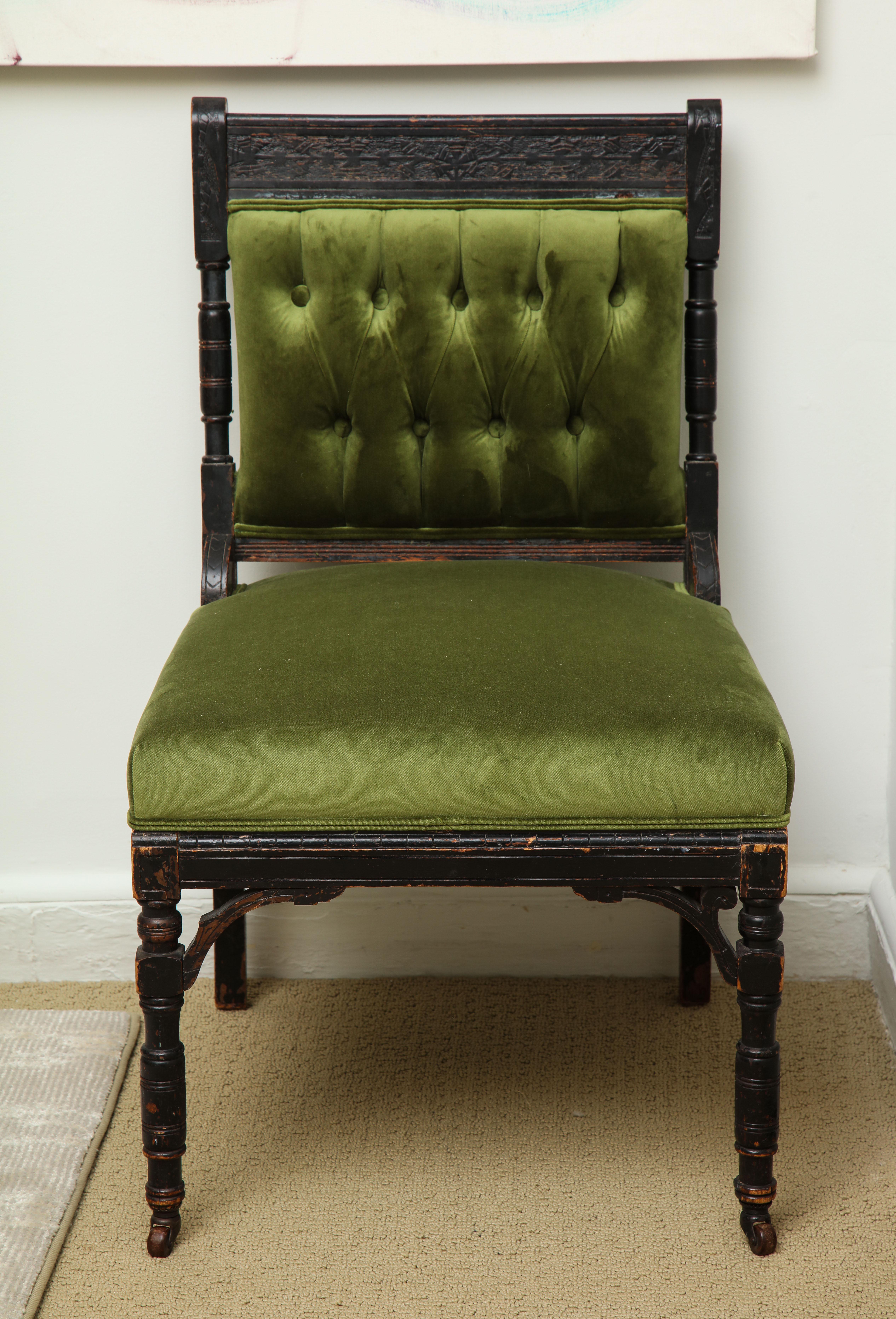 The Medieval chair is from a castle in Ireland. It was reupholstered with green velvet and it has all the original components, such as the wood and wheels.
There is visible wear and tear due to age and use.
The proportions of the chair is perfect