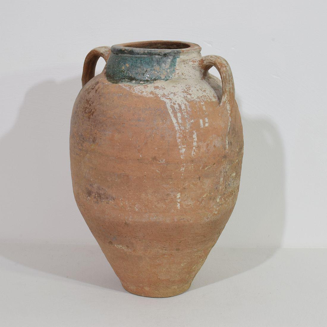 A wonderful and beautiful weathered olive oil jar. Traces of glaze visible.Turkey circa 1850. Weathered