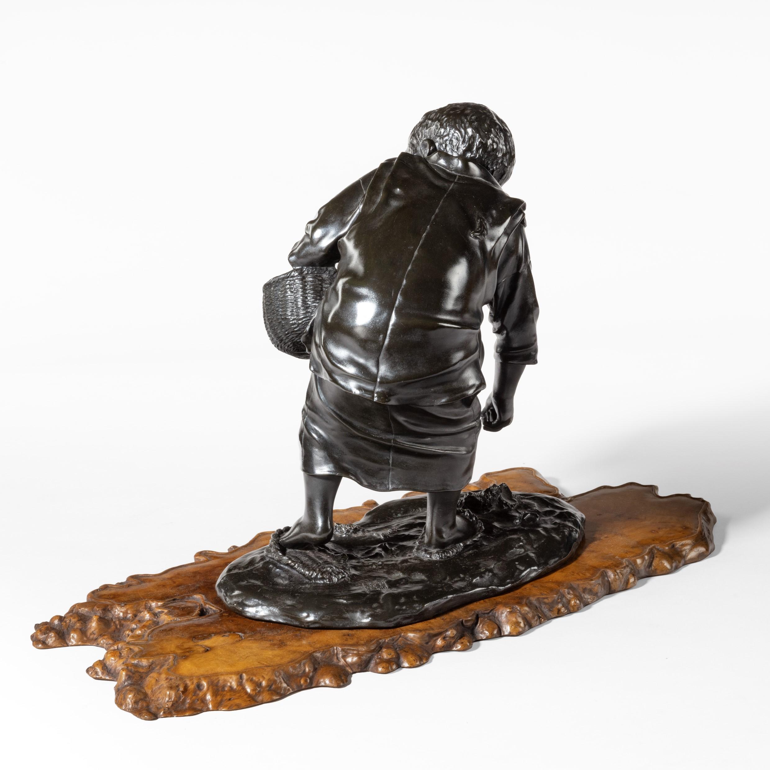 19th Century Meiji Period Bronze of a Boy Collecting Sweet Chestnuts by Seiya For Sale 1