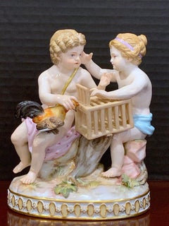 19th Century Meissen Grouping of Two Puttos Caging a Hen