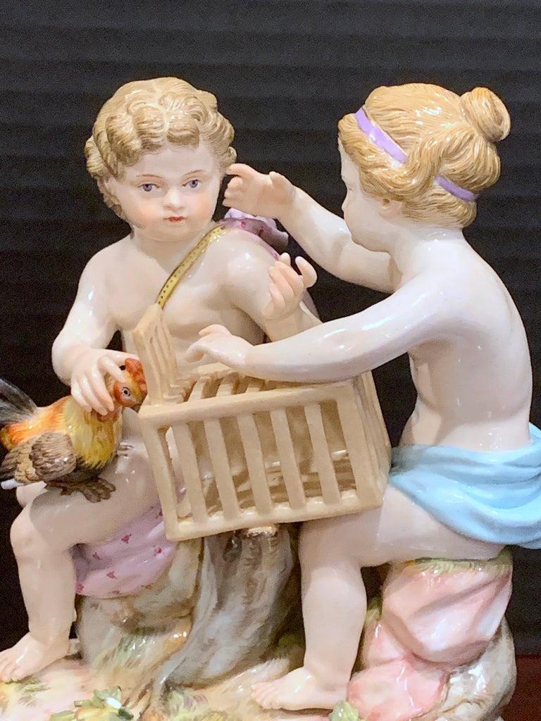 Porcelain 19th Century Meissen Grouping of Two Puttos Caging a Hen  For Sale