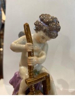 19th Century Meissen Porcelain Figure of Cupid with a Cheese Press