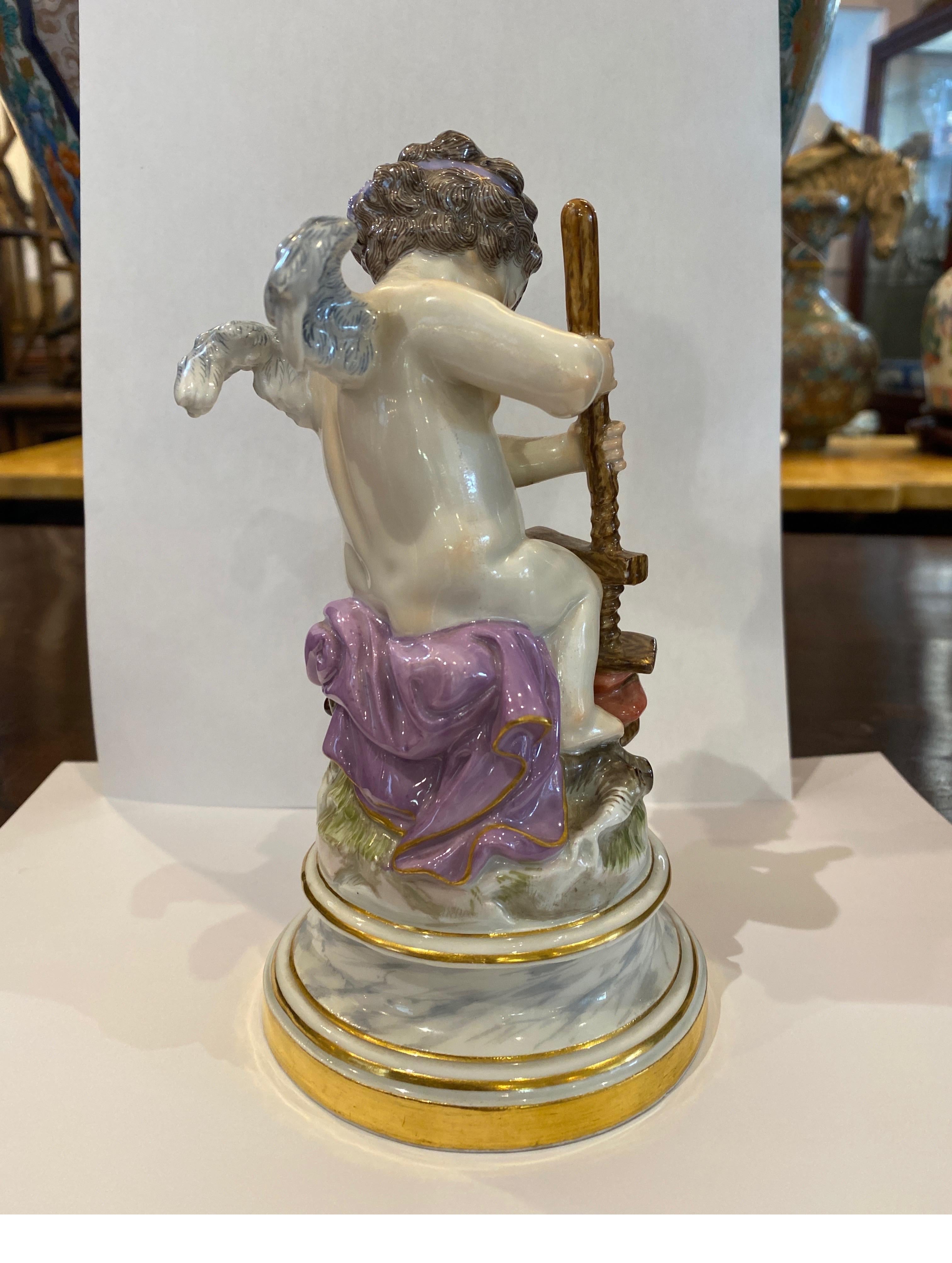 Hand-Painted 19th Century Meissen Porcelain Figure of Cupid with a Cheese Press
 For Sale
