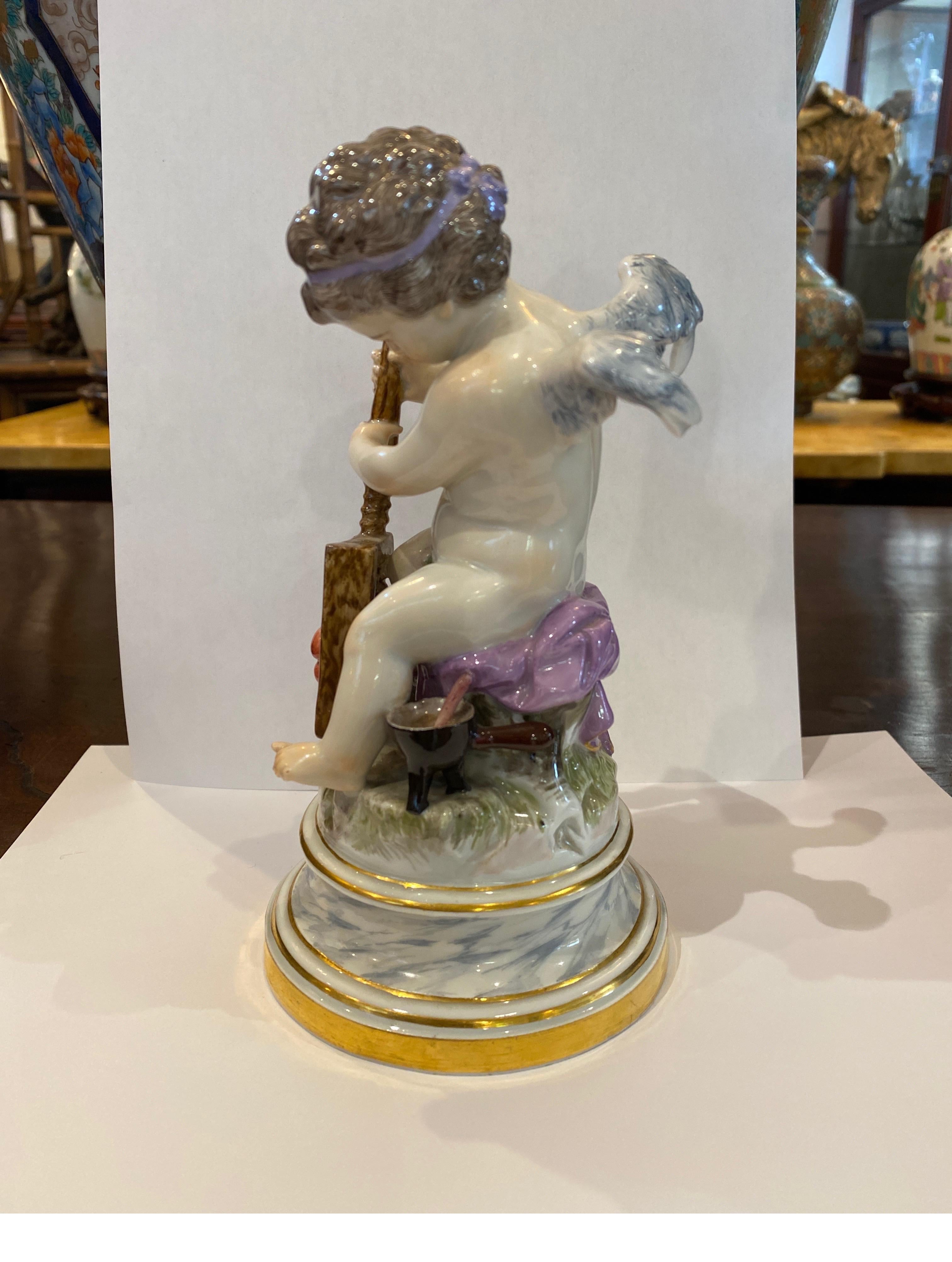 19th Century Meissen Porcelain Figure of Cupid with a Cheese Press
 In Excellent Condition For Sale In Lambertville, NJ