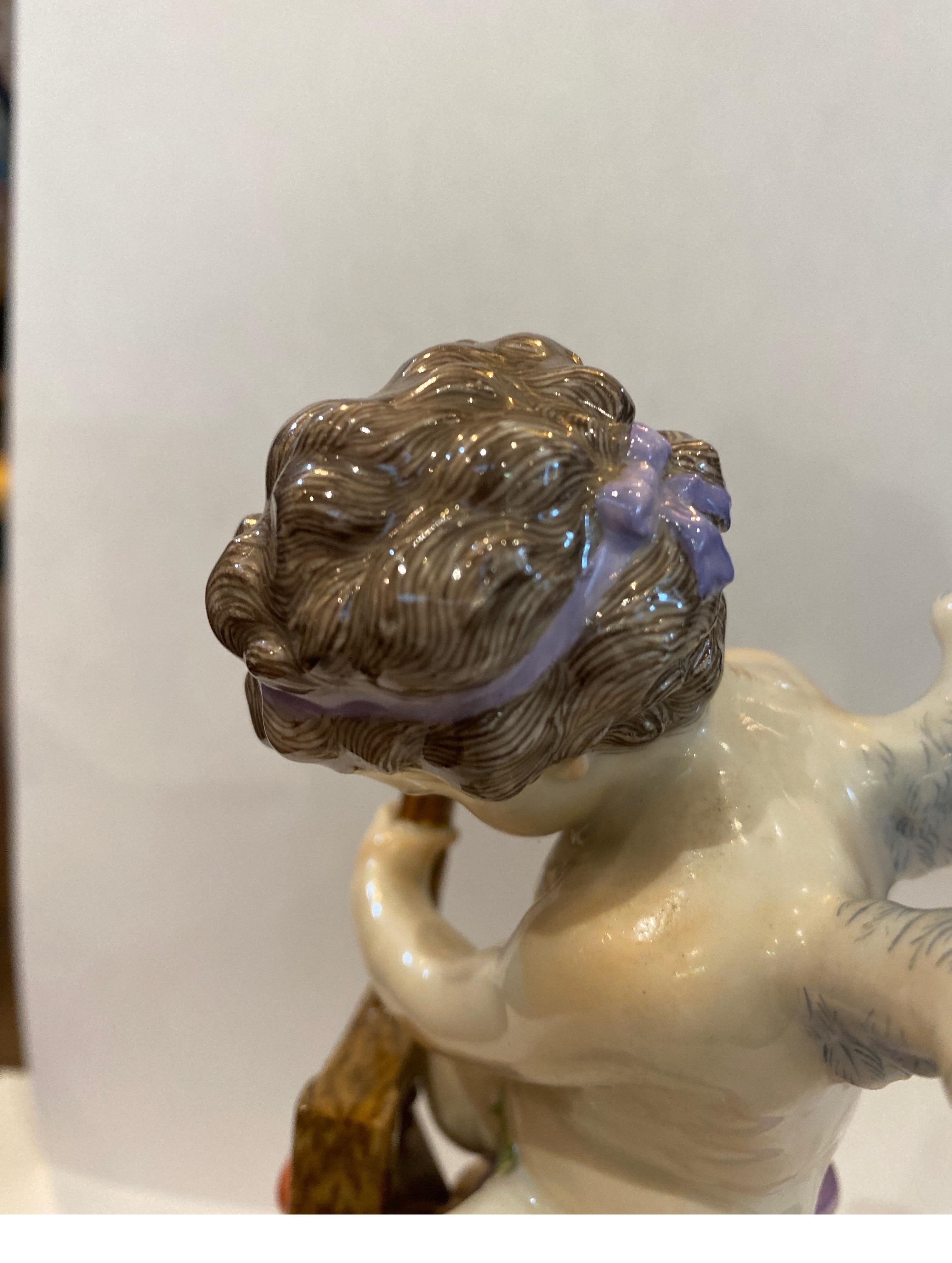 Mid-19th Century 19th Century Meissen Porcelain Figure of Cupid with a Cheese Press
 For Sale