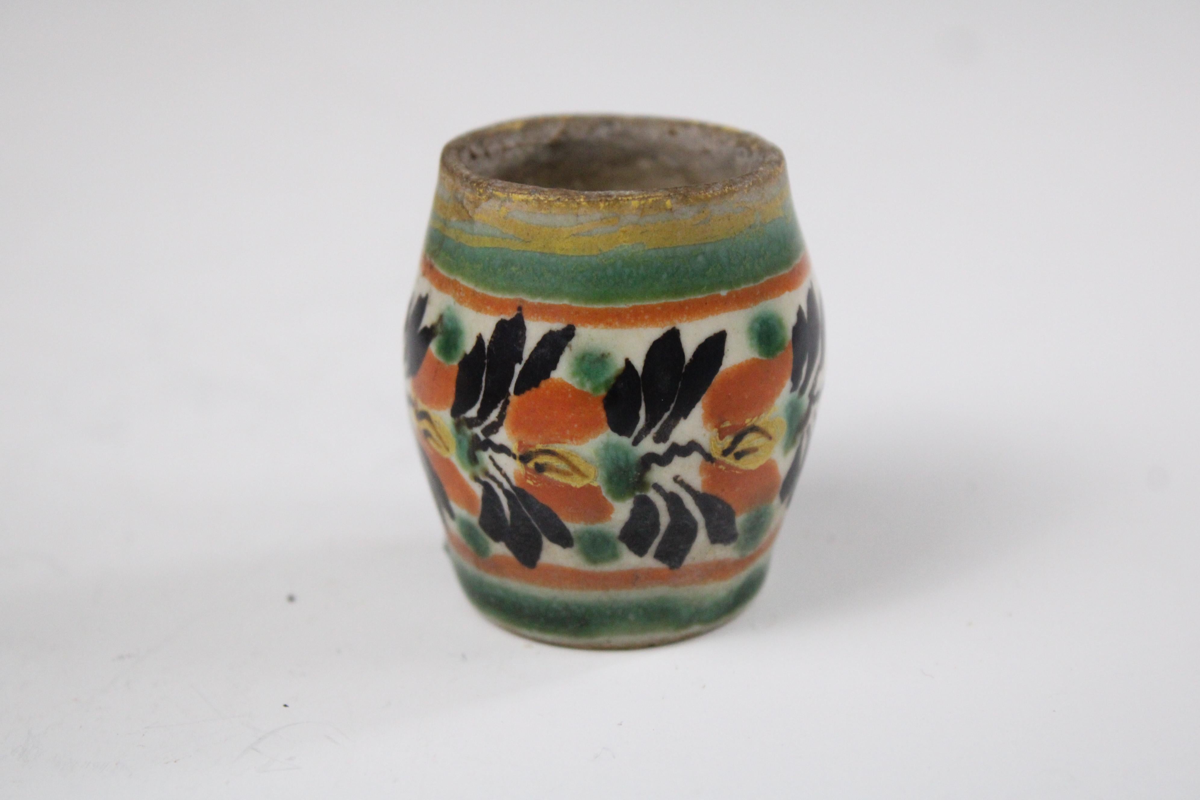 This exquisite set of three 19th-century Mexican miniature Talavera jars showcases the artistry and craftsmanship of traditional Talavera pottery. Each jar is hand-painted with intricate floral and geometric motifs, reflecting the rich cultural