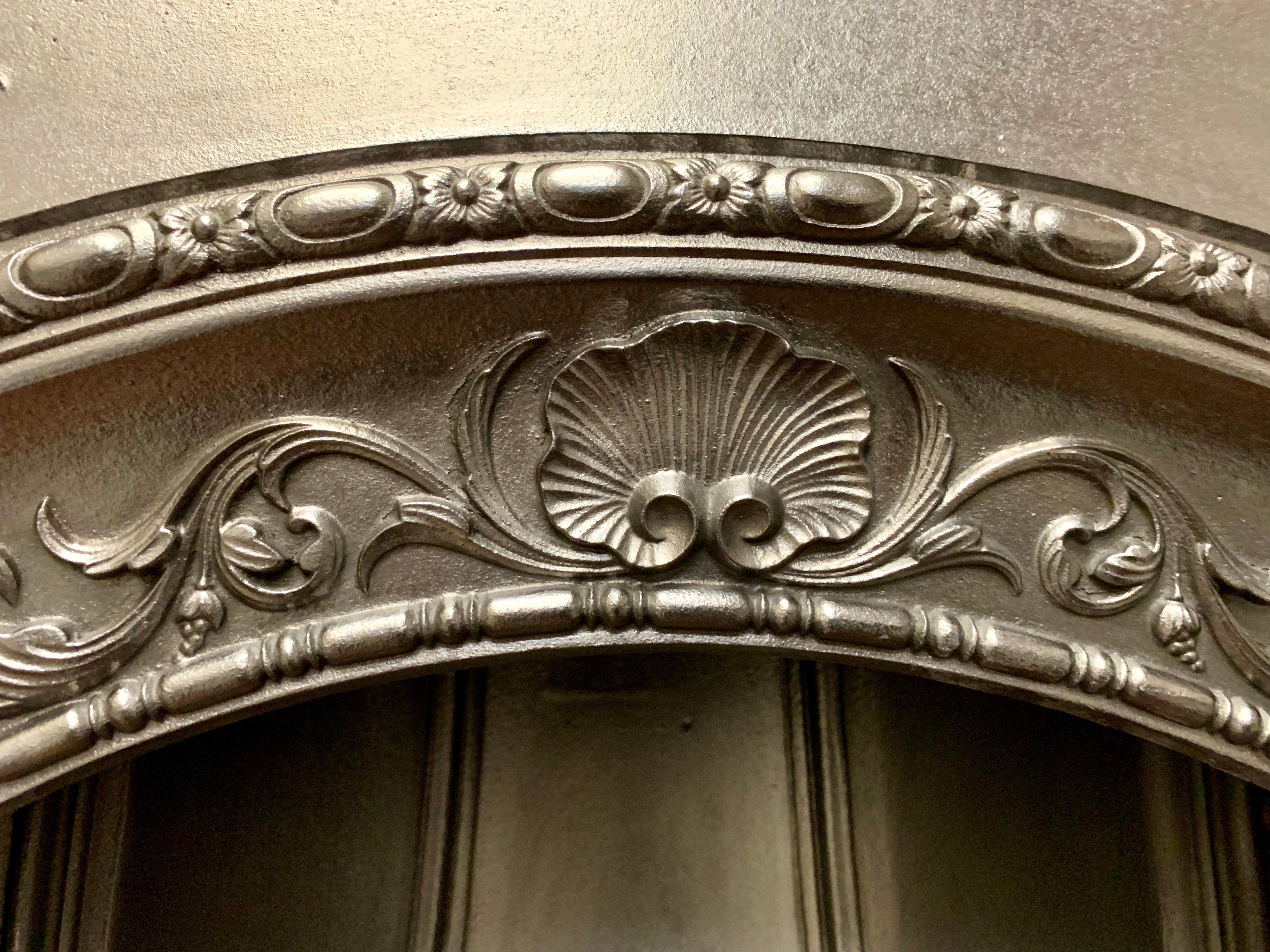 arched cast iron fireplace