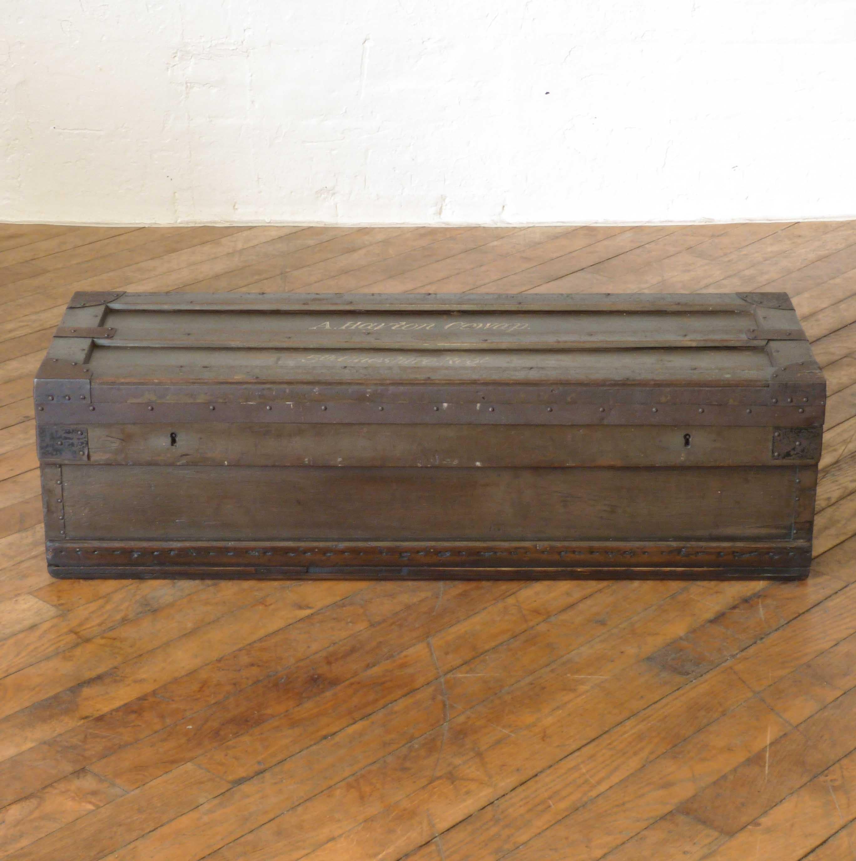 A steel box bound military box which has much of the original tin lined interior. The top is beautifully sign written A. Hayton Cowap.
  