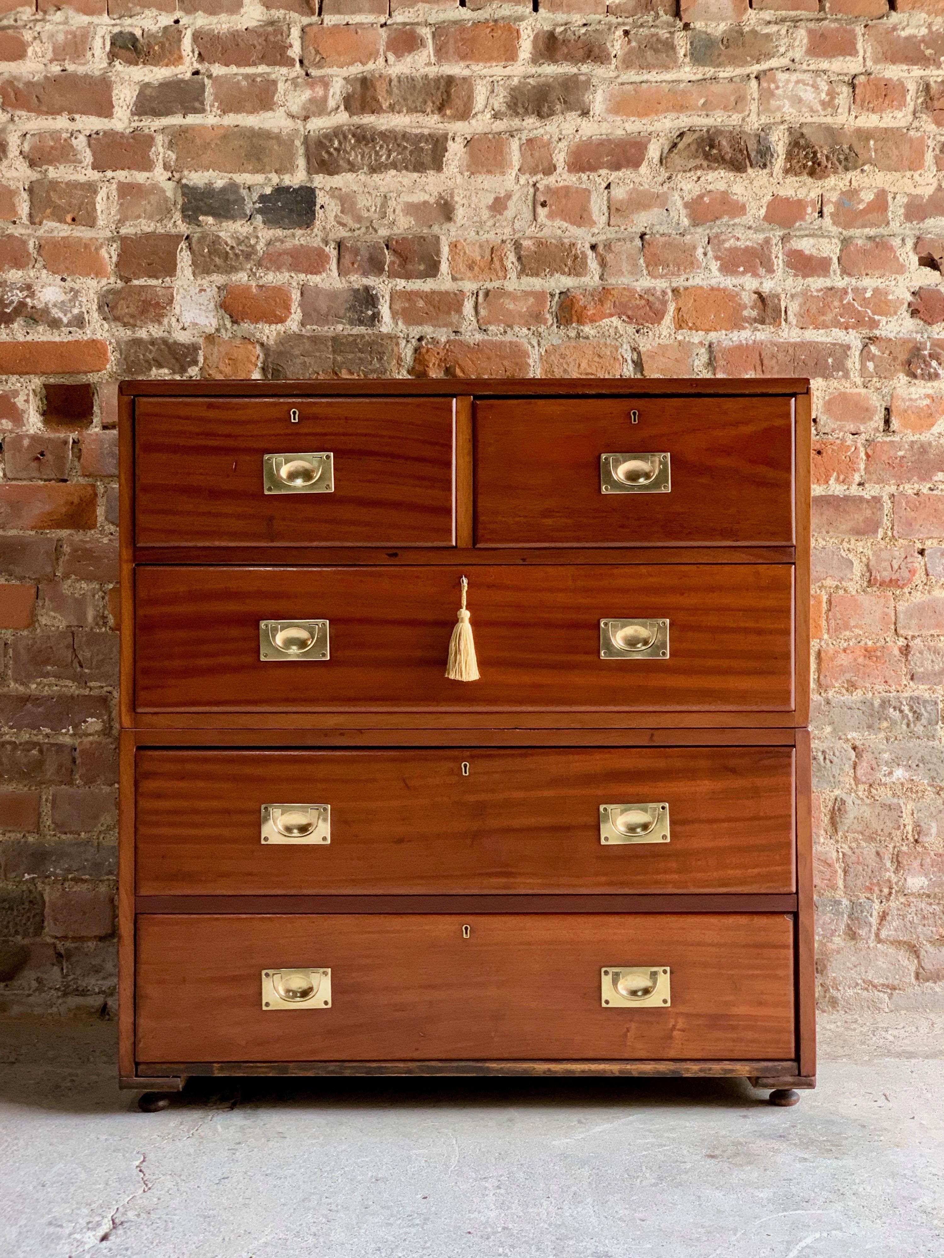 19th century Military Campaign chest of drawers in teak circa 1870 No: 23

A 19th century military Campaign teak chest of drawers circa 1870, the rectangular top over two short and three longer graduated drawers, all fitted with Campaign brass