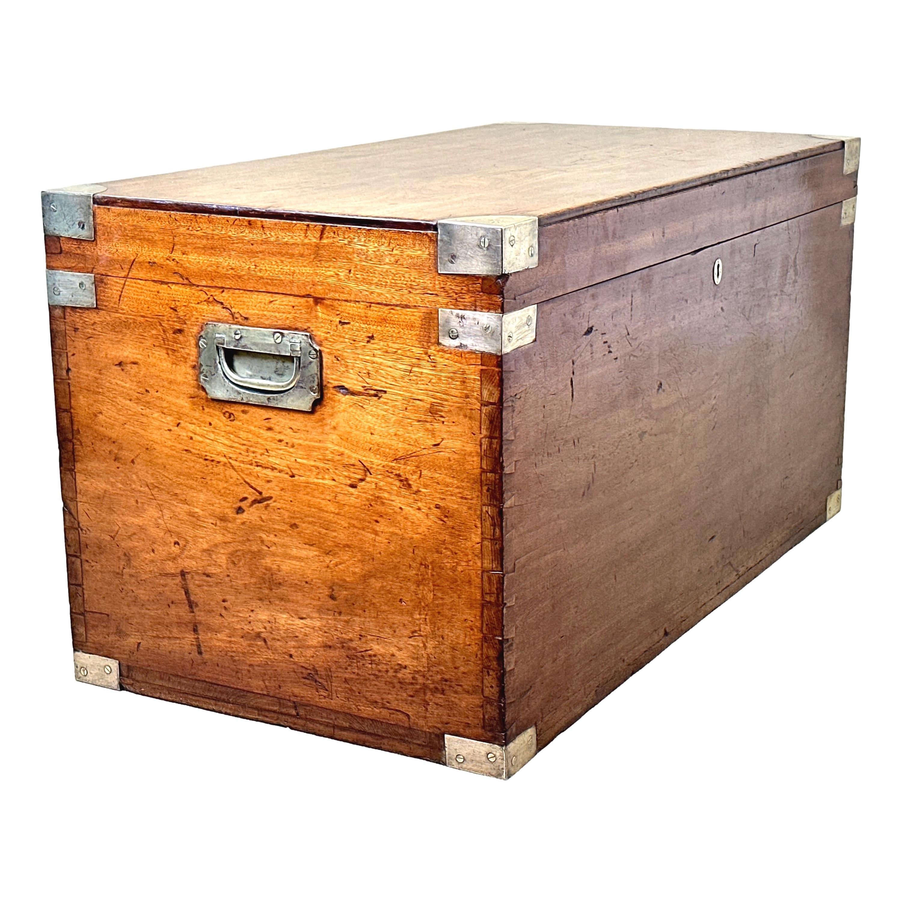 A very good quality 19th century camphor wood military Campaign trunk, Of Good Bold Proportions, Having Lift Up Lid, attractive original brass bound decoration and original flush fitted brass carrying handles to sides.


Its widely accepted that
