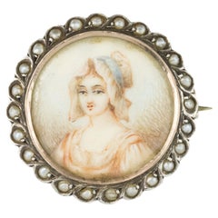 Broche miniature du XIXe siècle en argent et perles