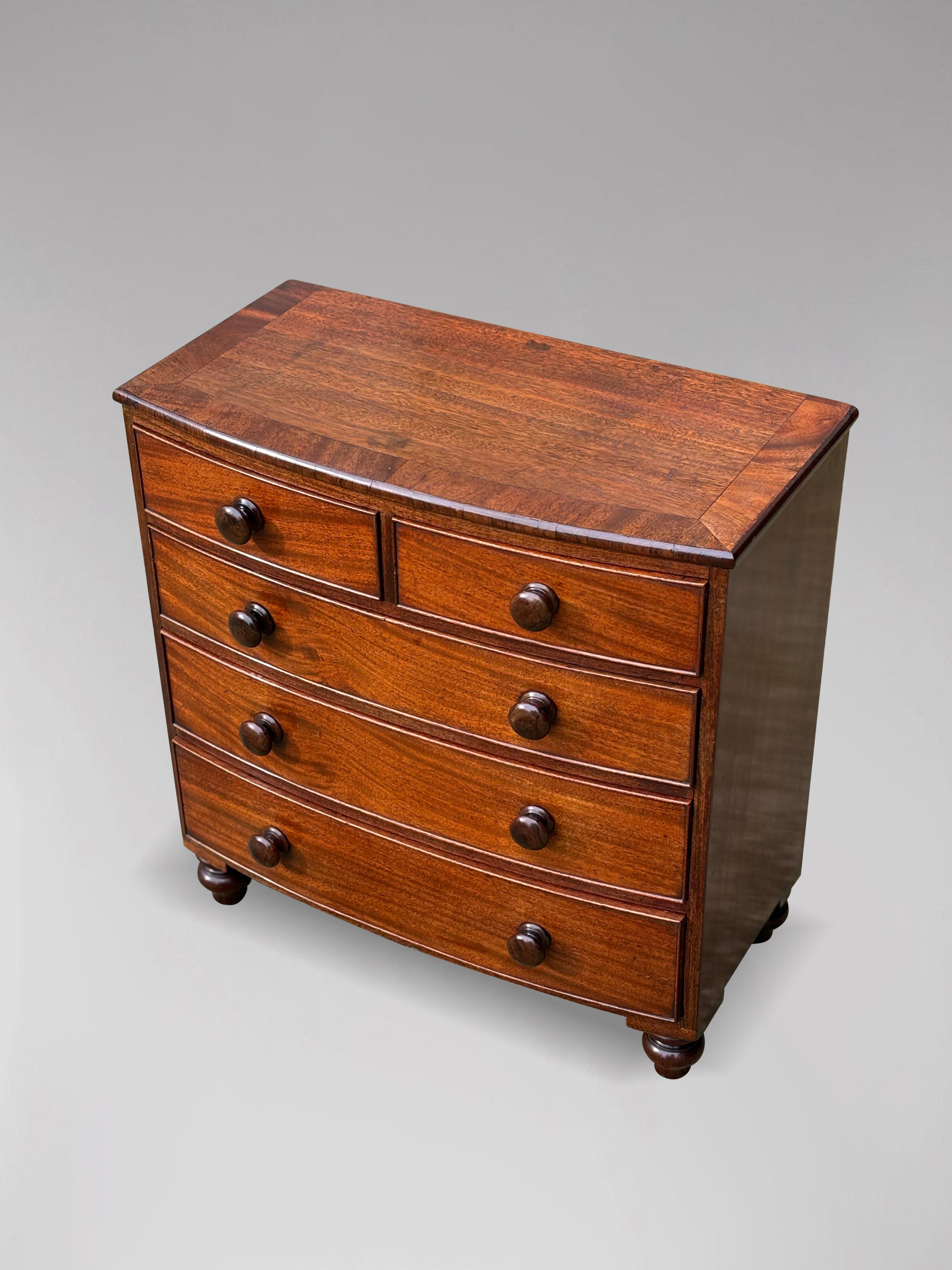 British 19th Century Miniature Bow Fronted Chest of Drawers For Sale