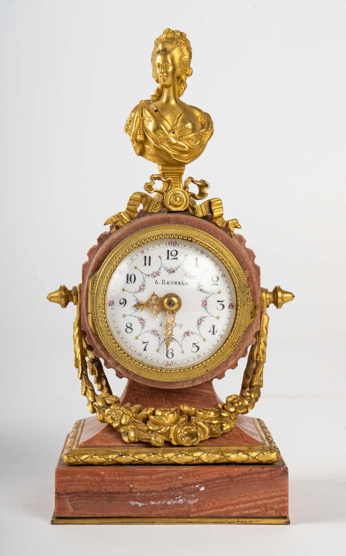 19th century miniature desk clock in gilt bronze and marble, Napoleon III period.
Dial signed by A. Daubrle
Pendulum - H 17 cm, W 9 cm, D 7 cm
Candelabra - H 13 cm, W 6 cm, D 6 cm.