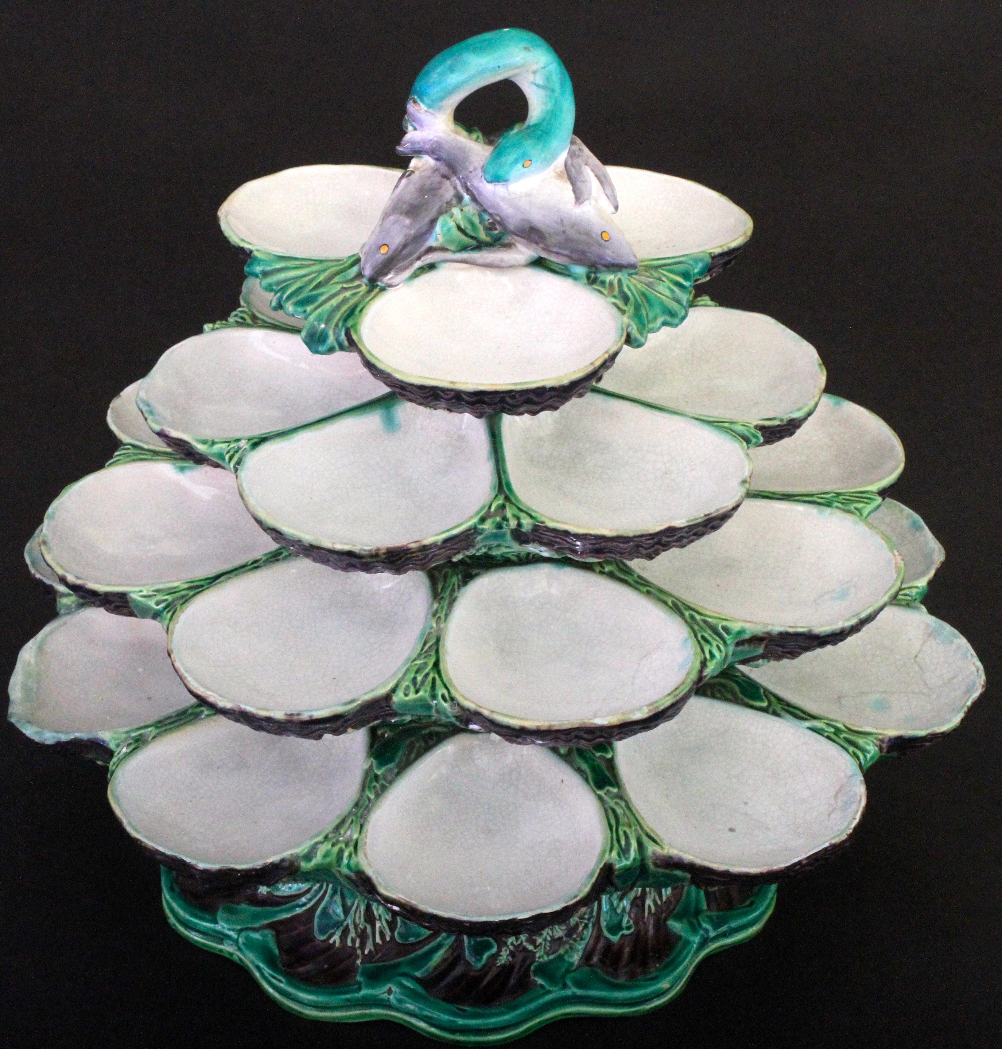 19th century Minton, Stoke-on-Trent, England hand-painted majolica 4-tier oyster server or stand - comes in two pieces, in perfect working order. This piece is beautifully painted: the body with varied green 