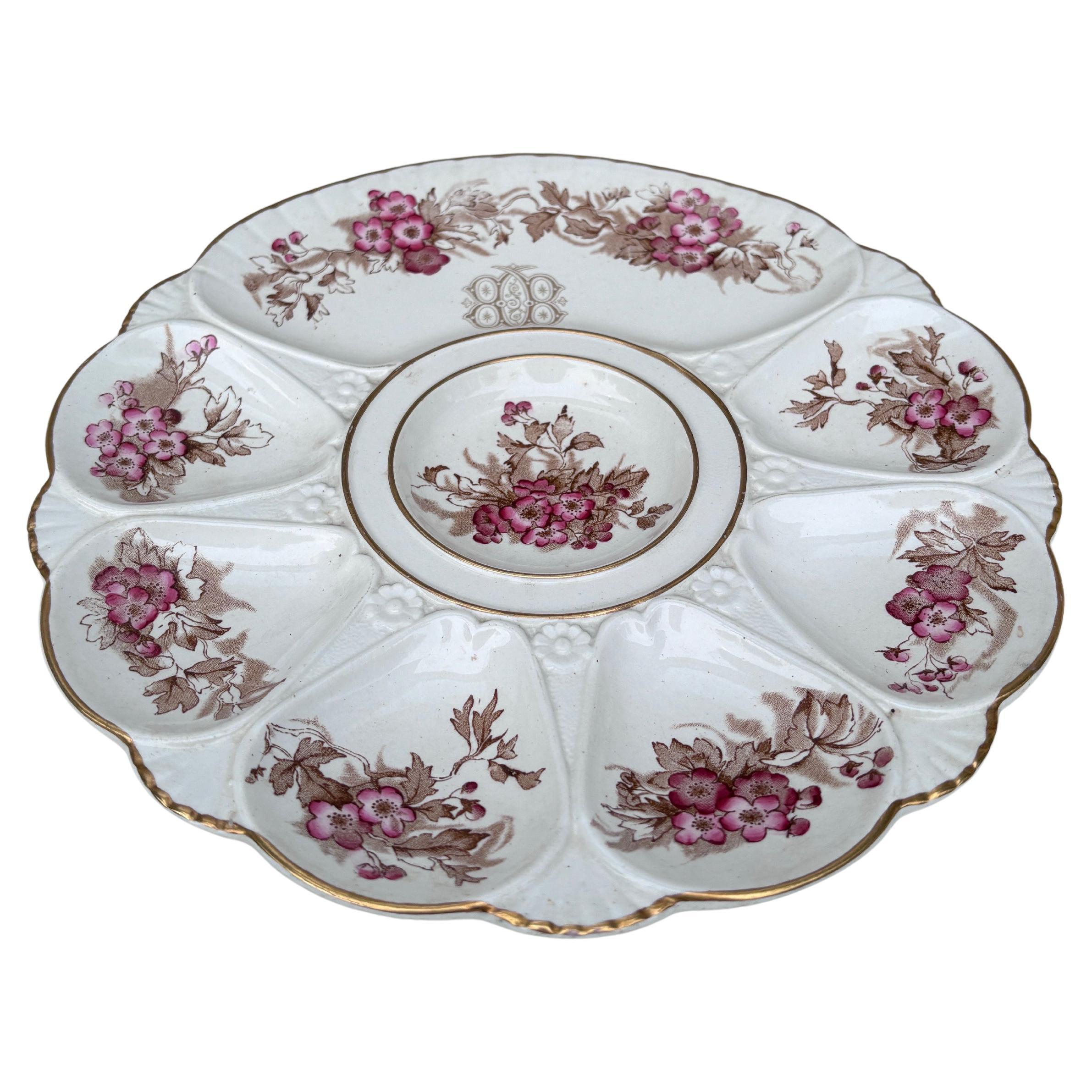 Assiette à huître à fleurs roses de Minton du XIXe siècle.