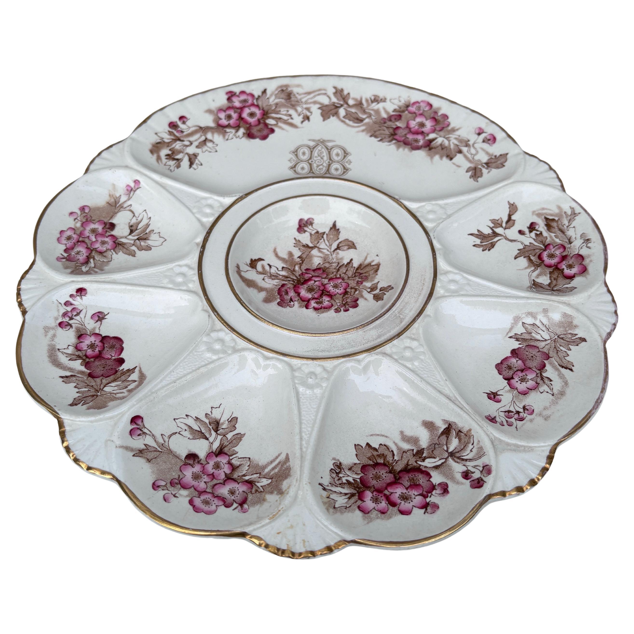 Assiette à huître à fleurs roses de Minton du XIXe siècle.