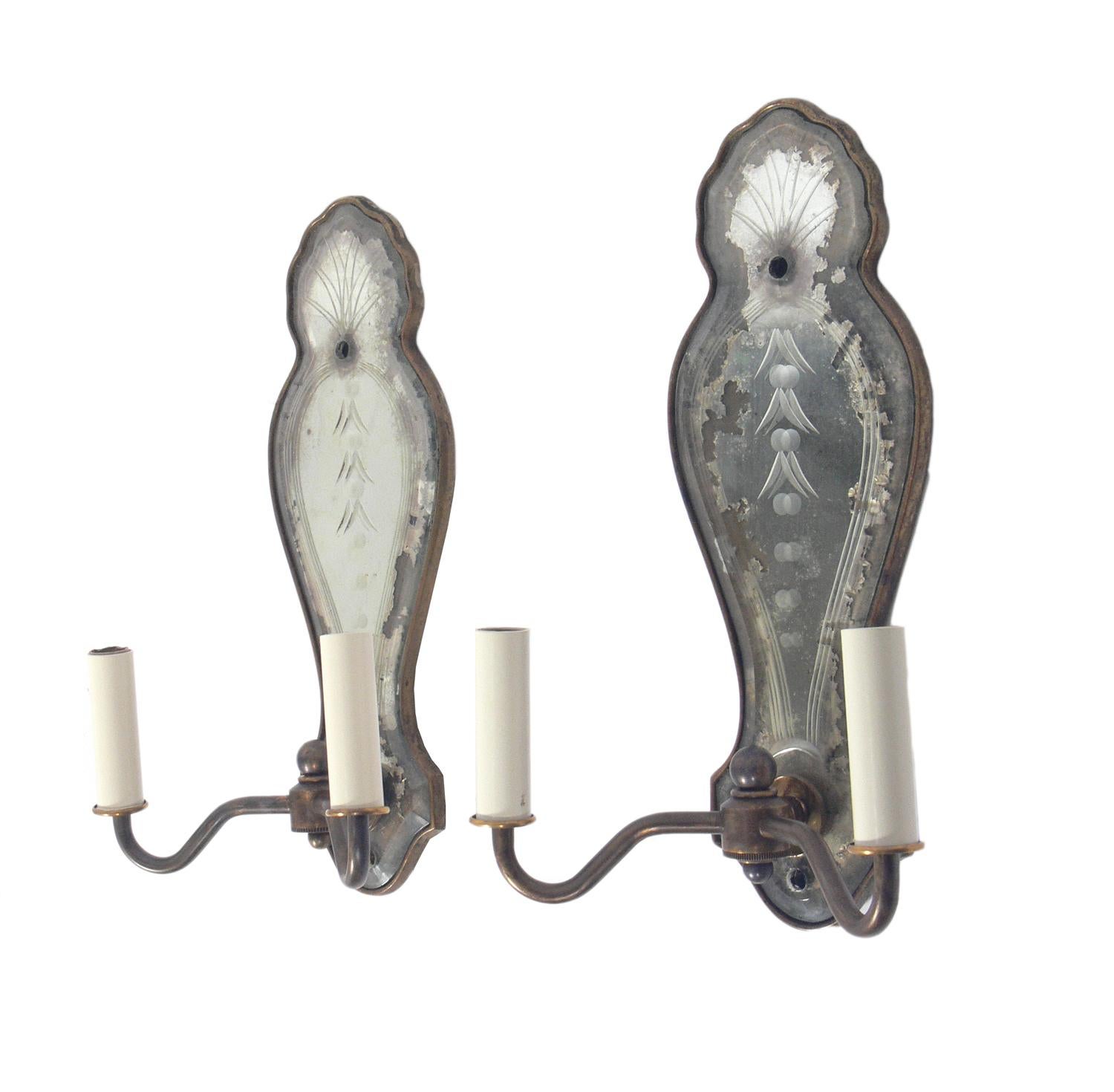 19th century mirror sconces, probably American, circa late 19th Century. They retain their original distressed patina. Originally candle sconces and converted to electric at some point, they have been rewired and are ready to mount.