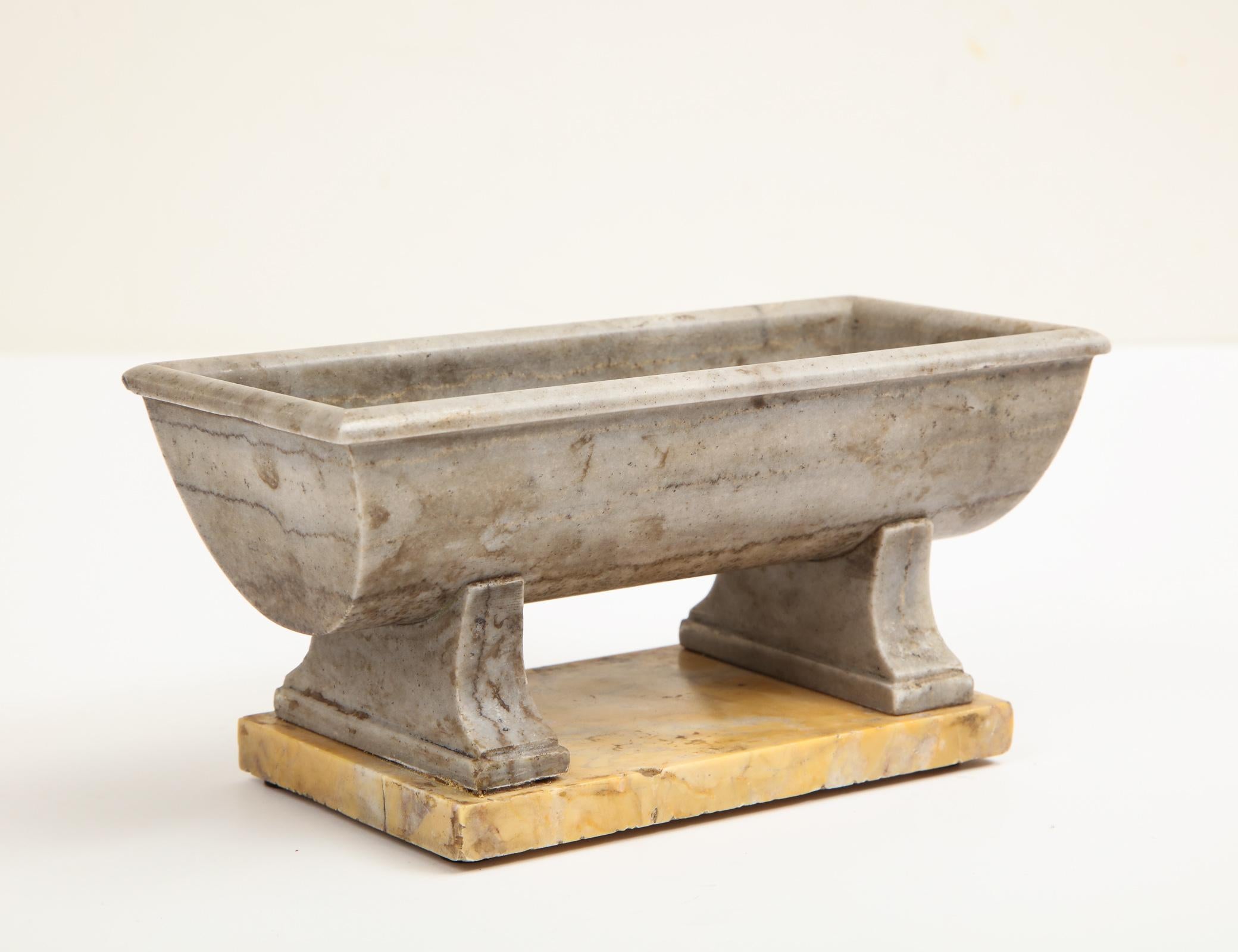 19th century Vasca,[bath], in ancient grey Greek marble on a sienna marble base.