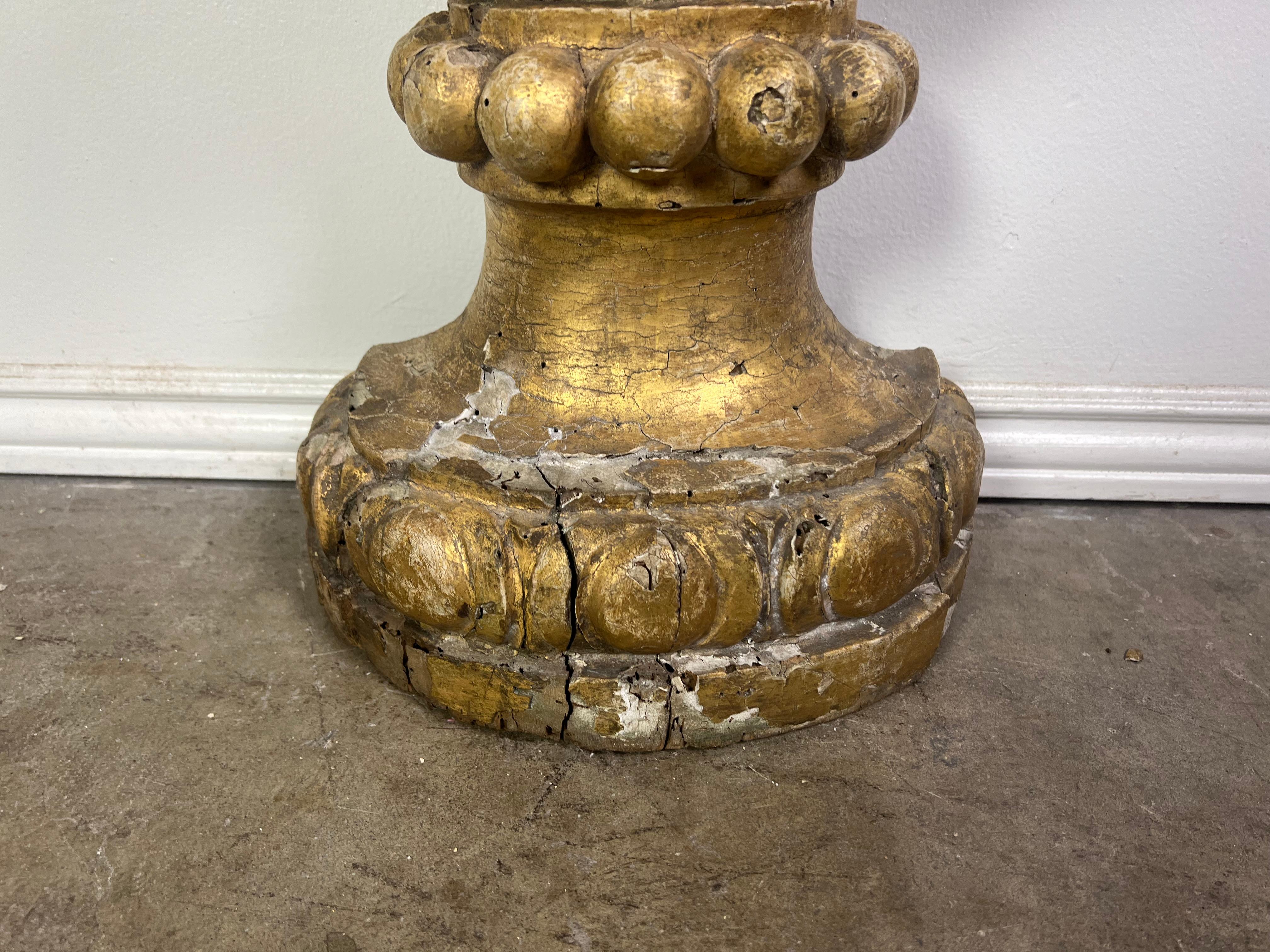 Early 19th century monumental Neoclassical style Italian gilt wood urn, detailed with acanthus leaves, scrolled arms and beading.