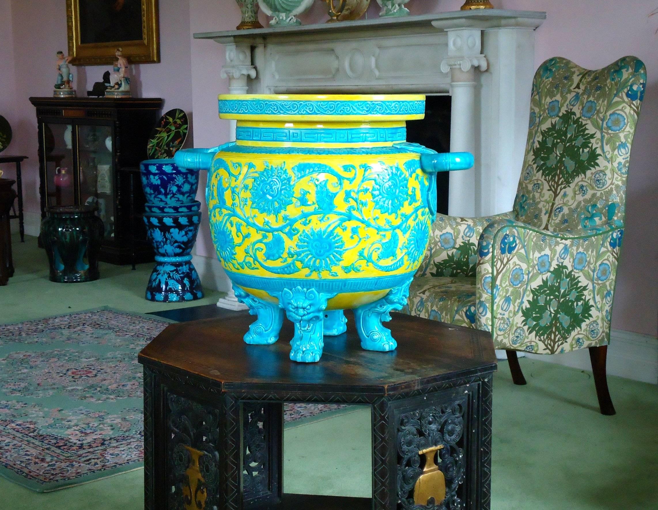 A rare Minton Majolica floor jardinière in the Chinese style decorated in imperial yellow and Persian blue glazes. Minton introduced these two new glazes at the Vienna Exhibition 1873 displaying a group of Oriental inspired vases and jardinières.
