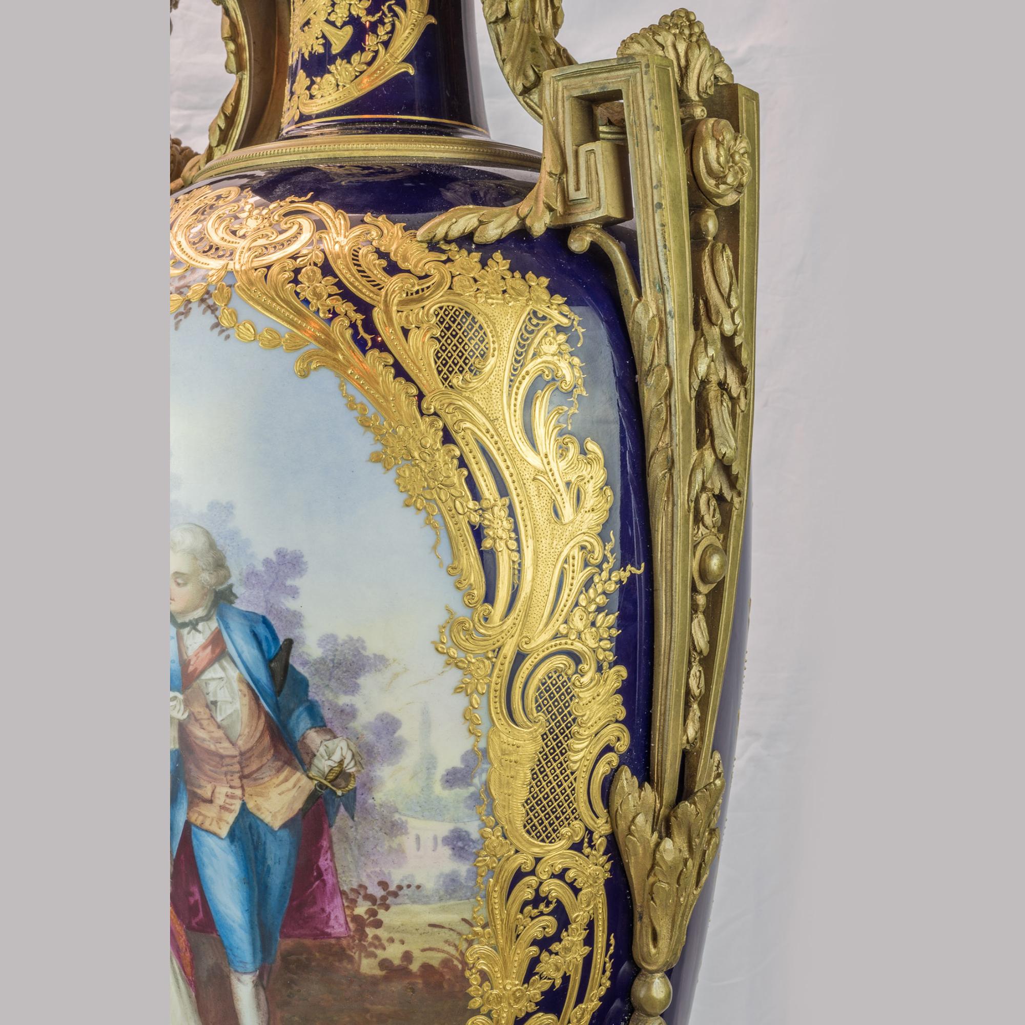 French 19th Century Monumental Pair of Sevres Style Ormolu Mounted Vases For Sale