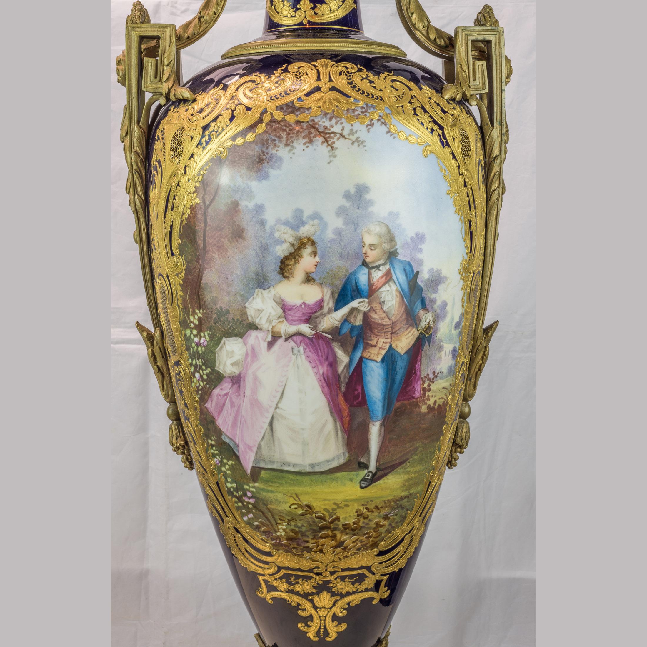 Gilt 19th Century Monumental Pair of Sevres Style Ormolu Mounted Vases For Sale