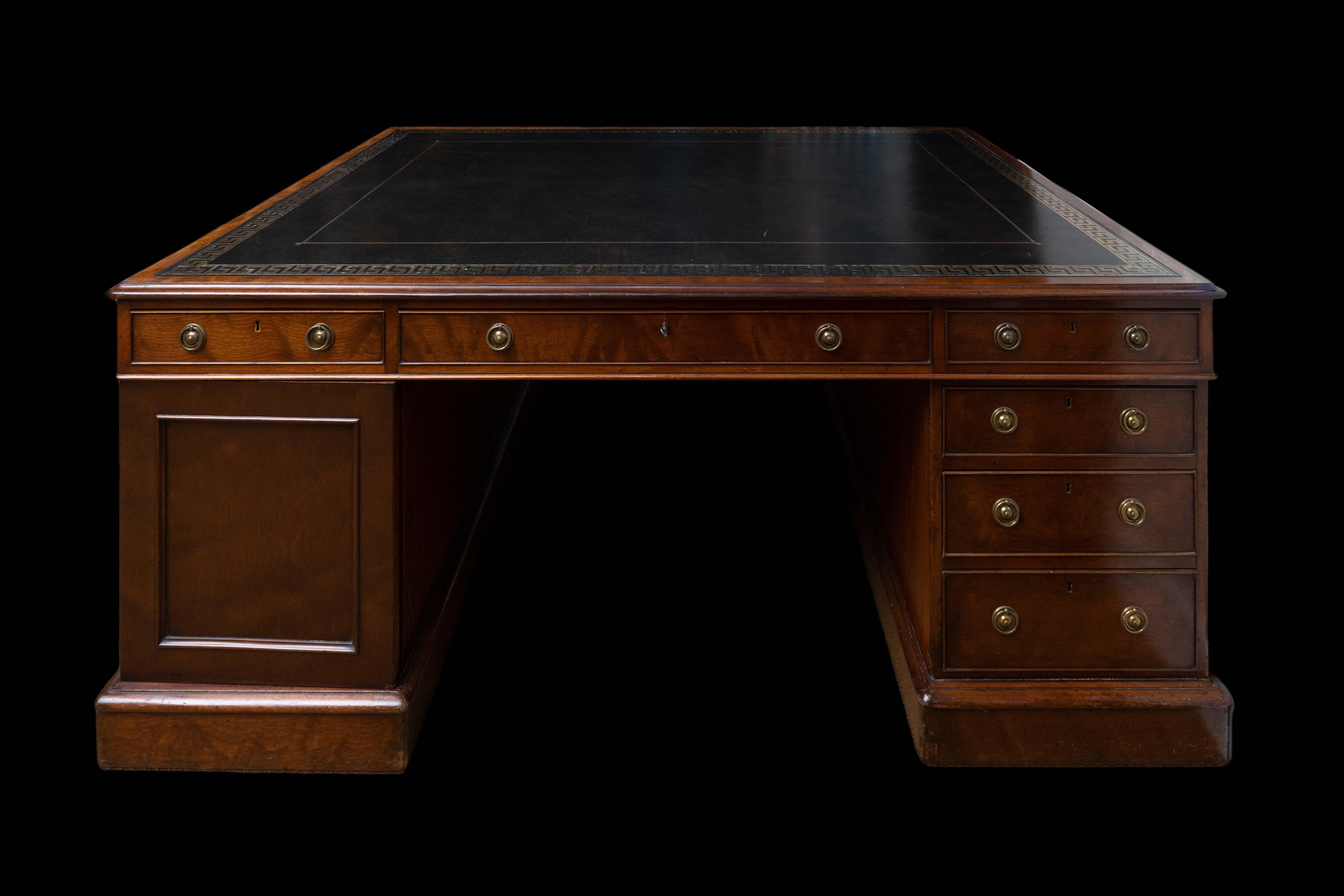 This exceptional Victorian mahogany Partner's desk is a true masterpiece of British furniture craftsmanship. The desk has been carefully restored in London, bringing it back to its former glory and ensuring that it will be a treasured addition to