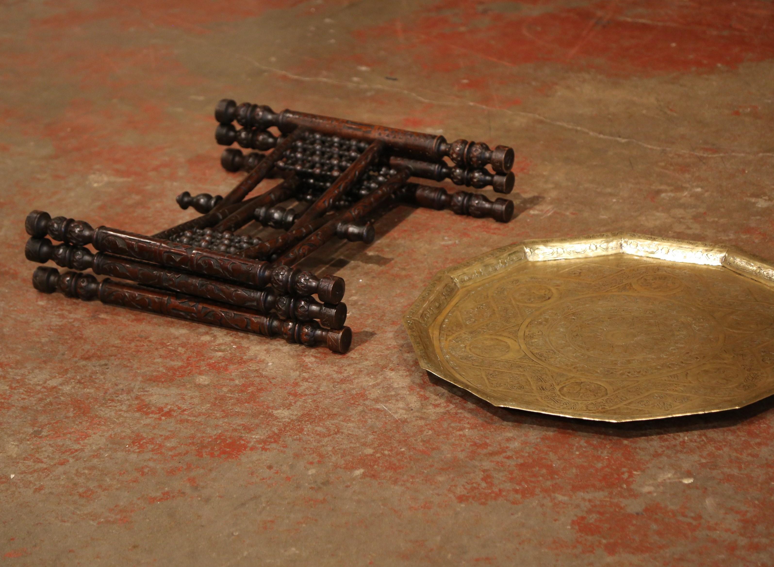 19th Century Moroccan Carved Six-Leg Folding Table Base with Engraved Brass Top In Excellent Condition In Dallas, TX